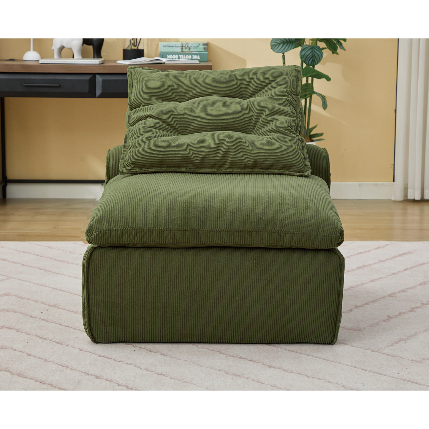 Plush green corduroy accent chair with tufted seat and removable cushion