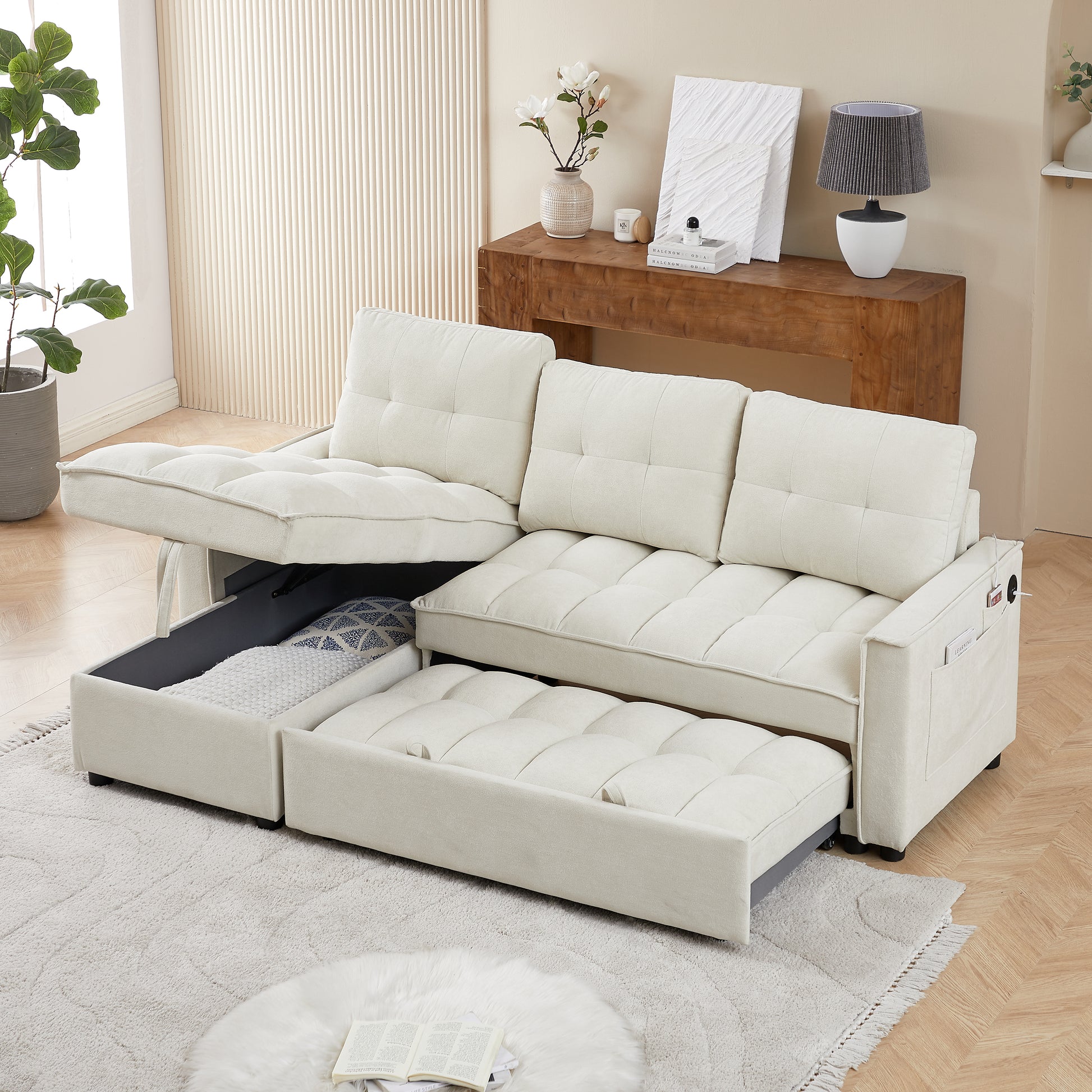Cream sectional sofa bed with storage drawers open showing ample storage space