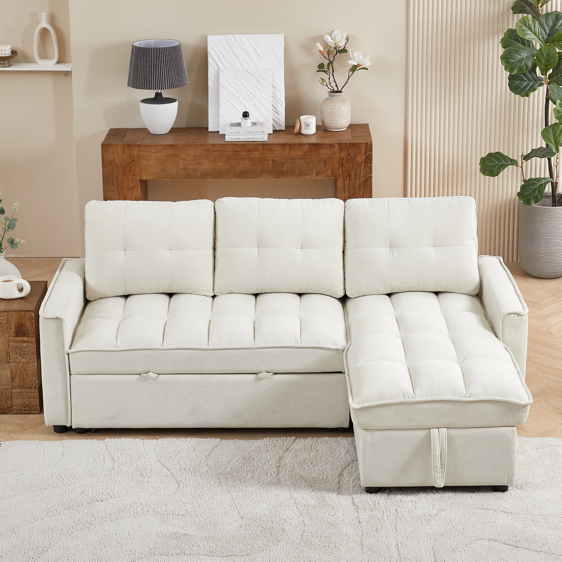 Cream Lshaped sofa with storage chaise and tufted cushions