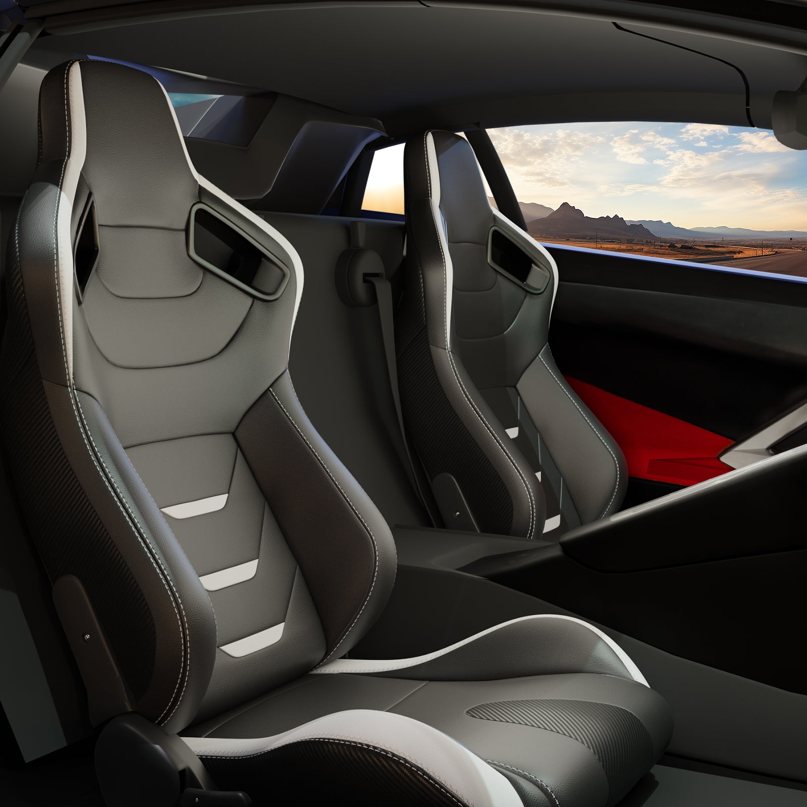 Black leather sport bucket seats with white stitching and gray accents for a performance car