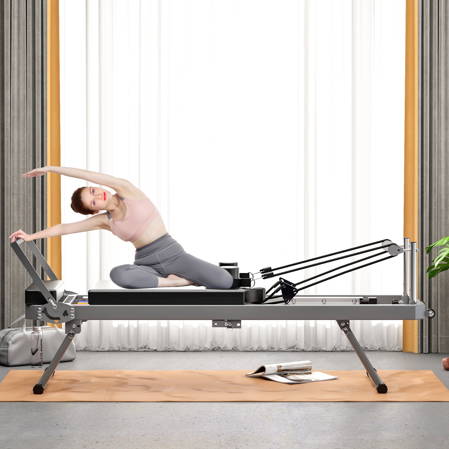 Woman stretching on a gray Pilates reformer with resistance bands