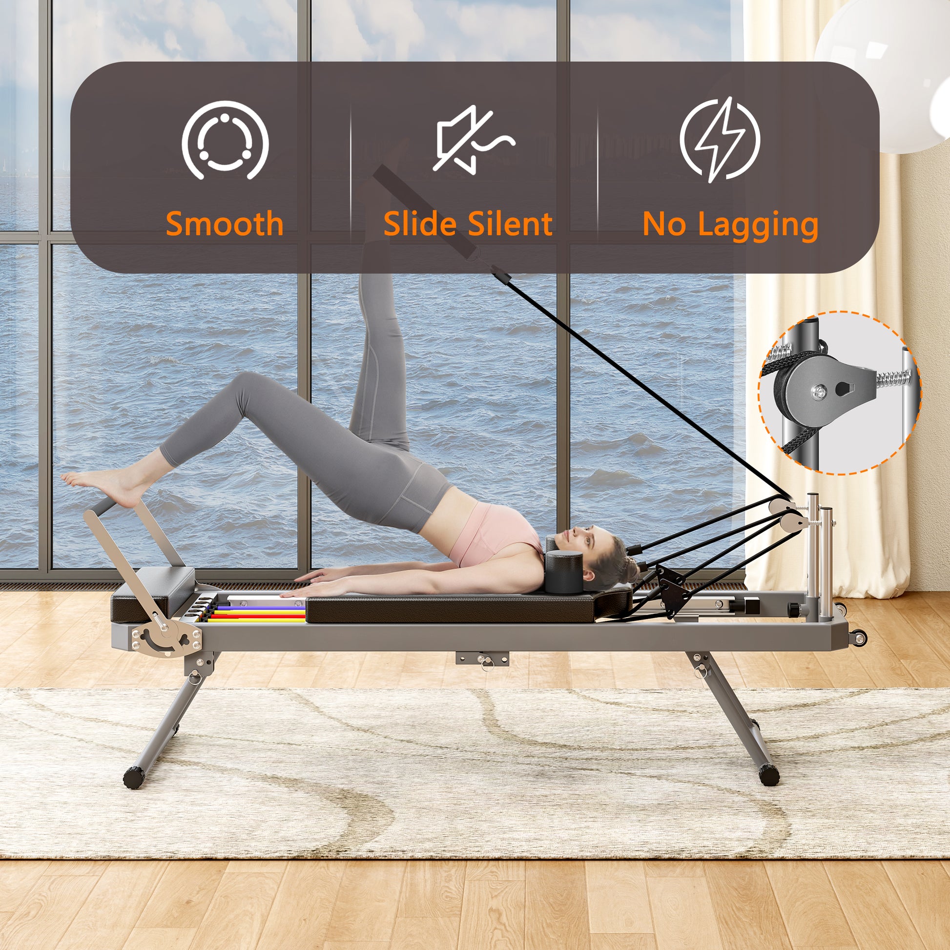 Pilates reformer machine with a woman performing bridge pose on a dark padded surface