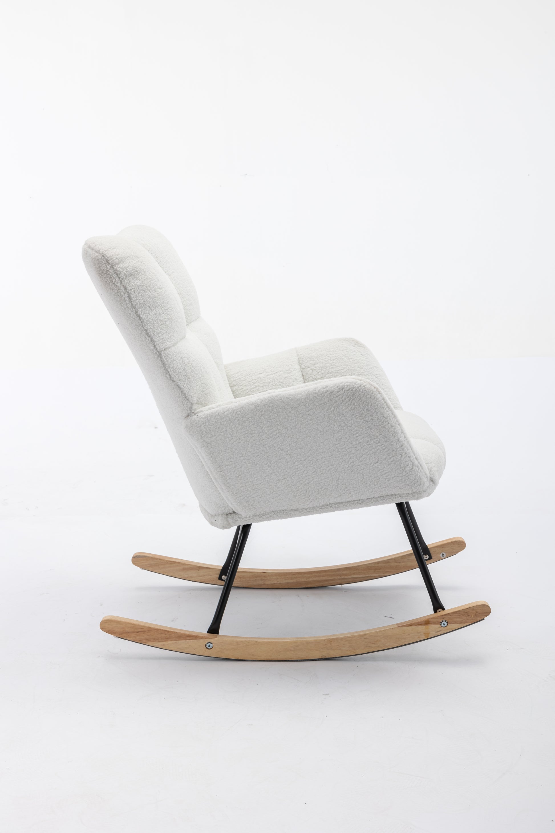 Plush white boucle fabric armchair with a modern rocking base for ultimate relaxation