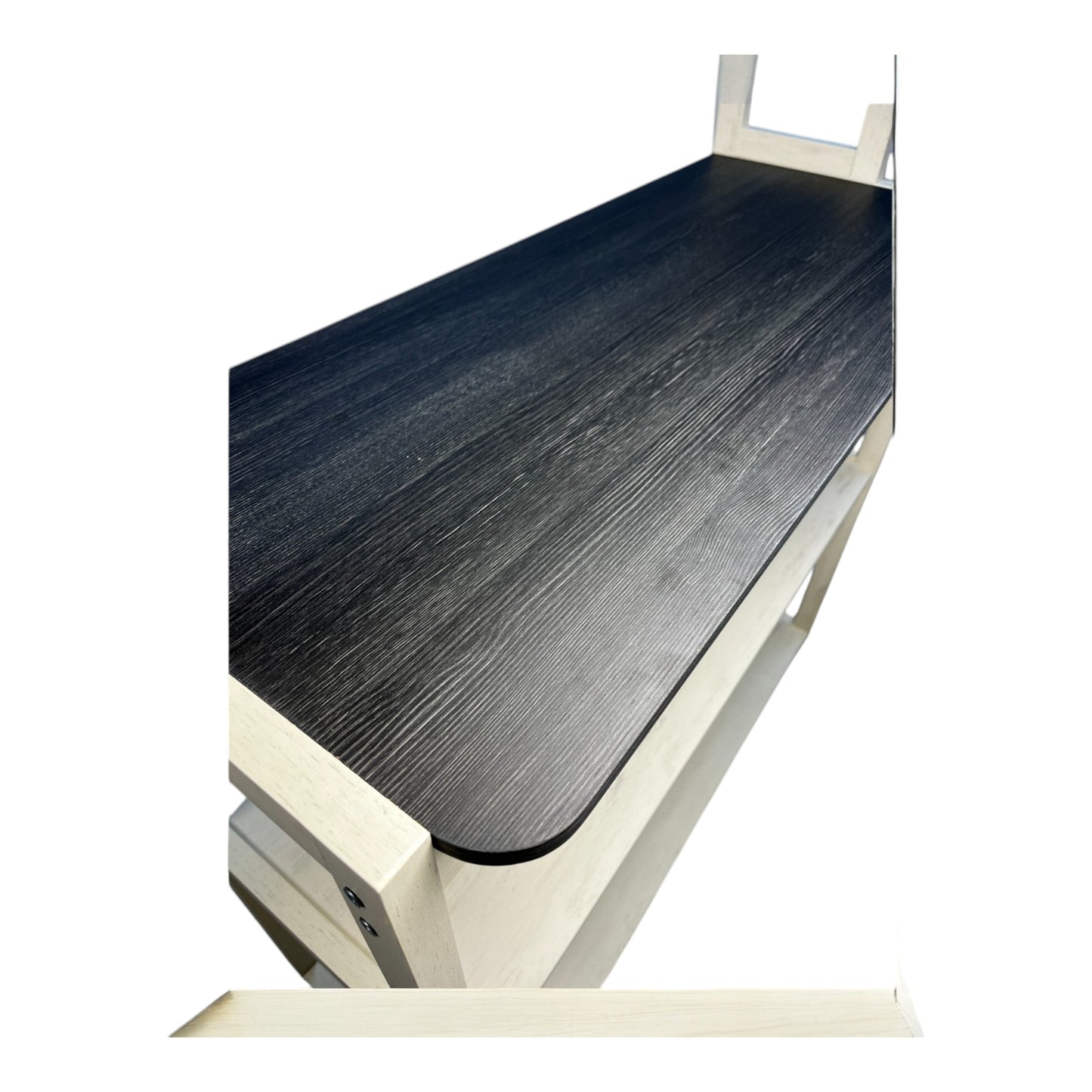 Closeup of a white wood frame with a black wood grain shelf modern design