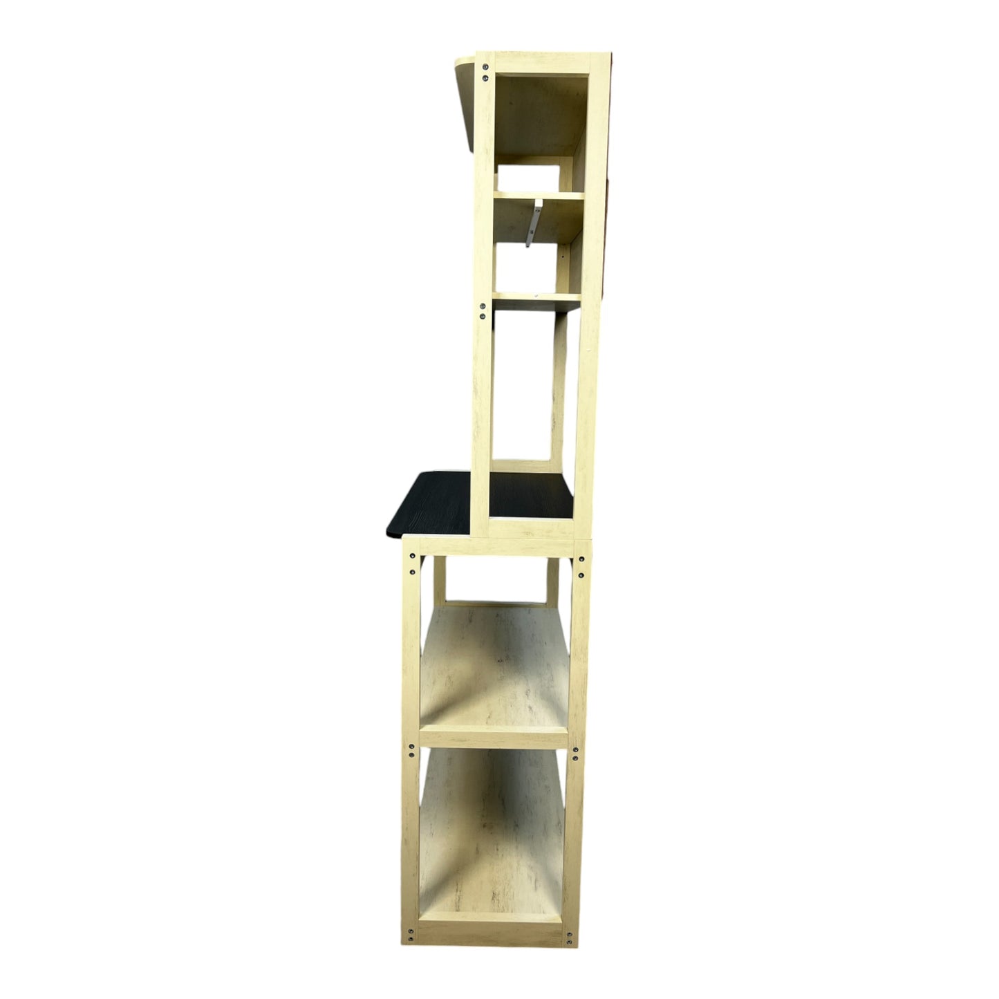 Tall light wood shelving unit with black desk insert