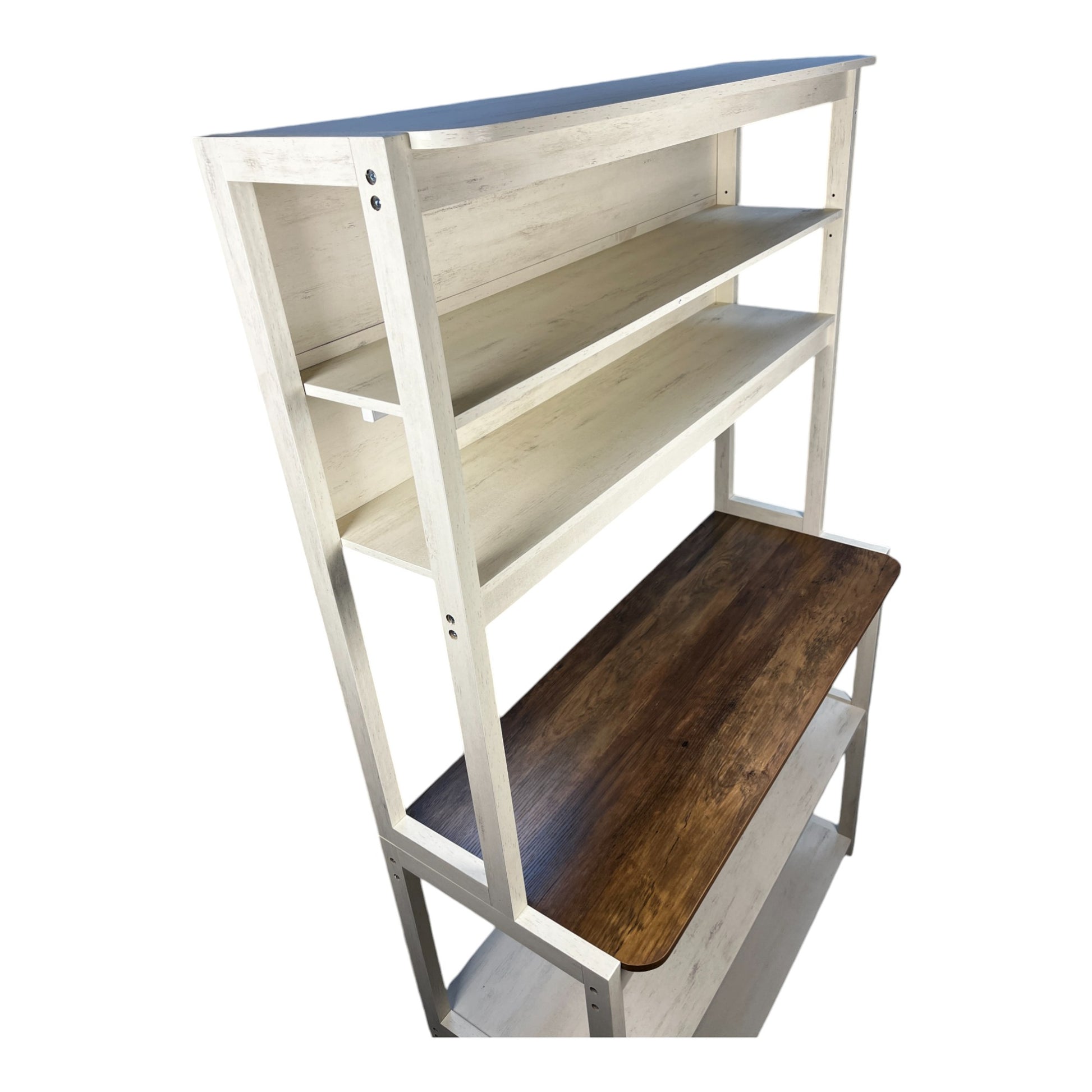Distressed white wood bakers rack with dark wood countertop and three shelves