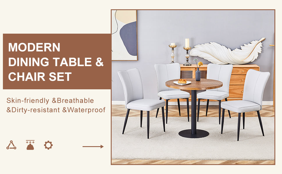 Round wood modern dining table set with four white upholstered chairs