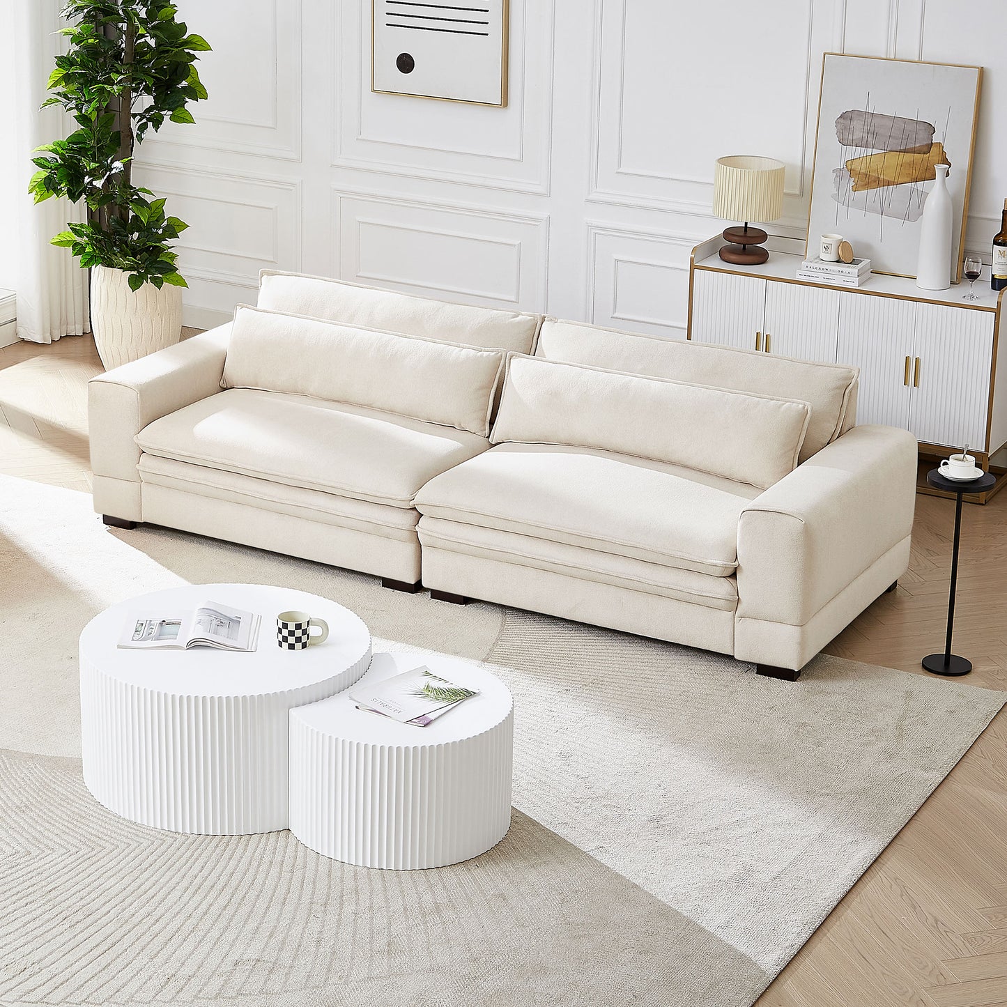 Plush cream sectional sofa with deep cushions and accent pillows for a modern living room