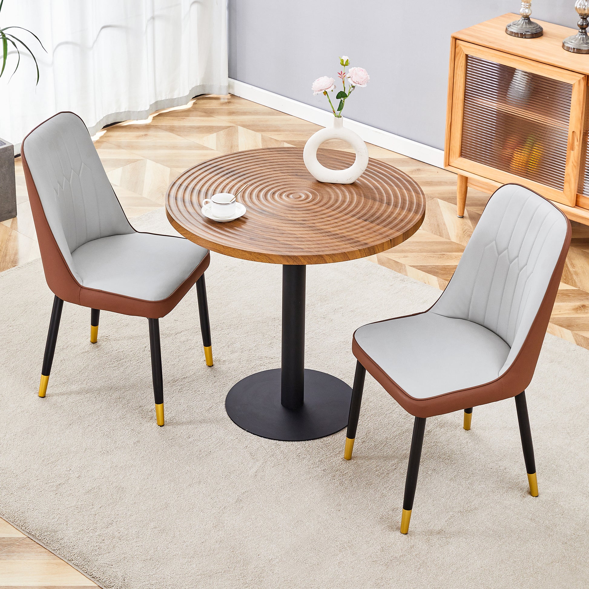 Elegant midcentury modern dining chair with light grey upholstered seat and brown faux leather back