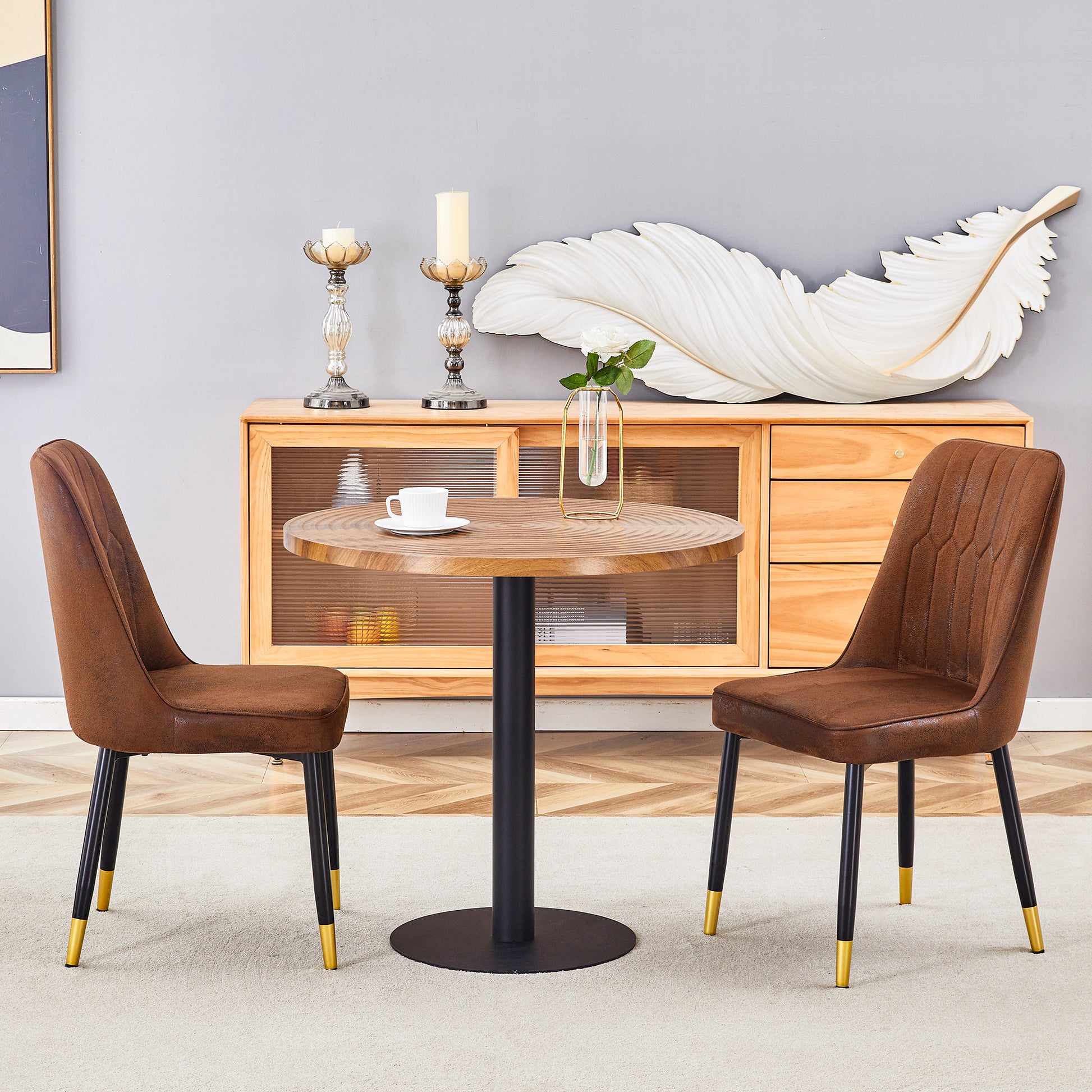 Brown faux leather dining chair with quilted back and goldtipped black legs