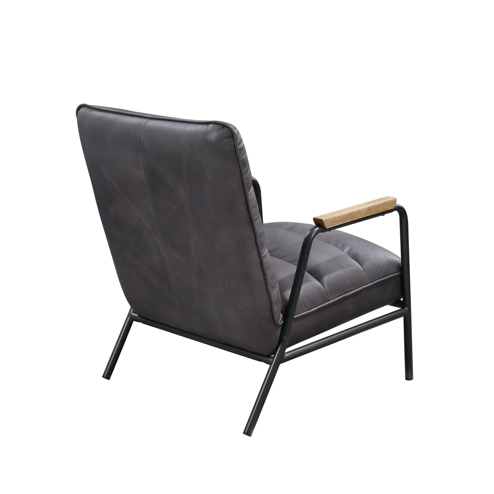 Dark grey tufted leather accent chair with black metal frame and natural wood armrests