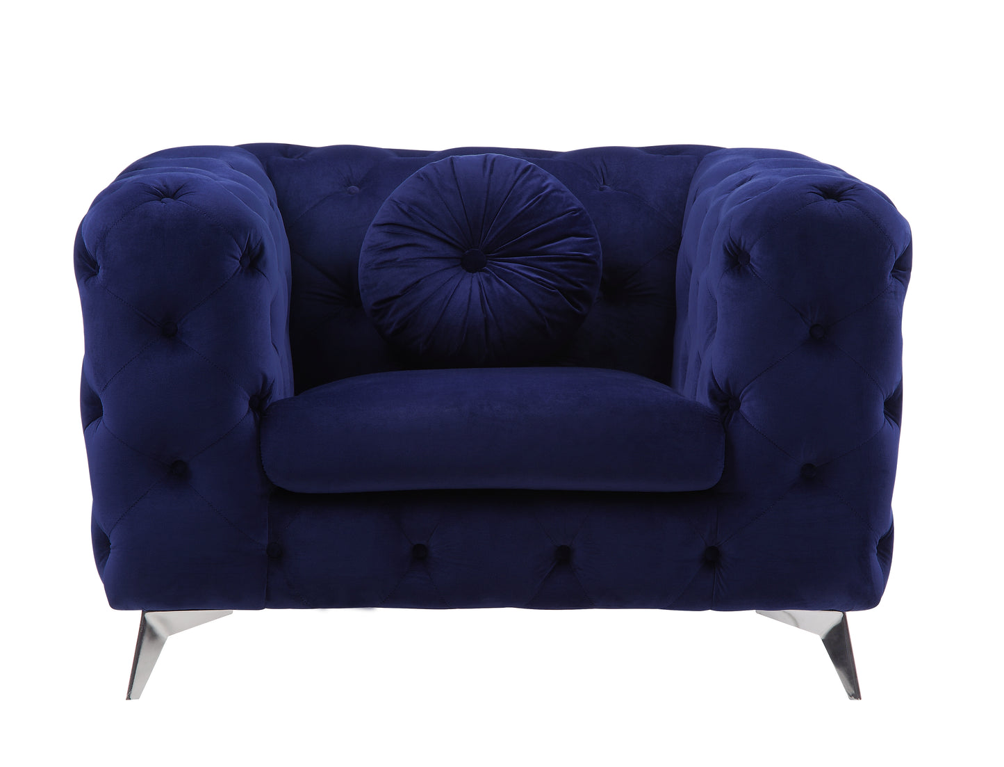 Tufted navy blue velvet armchair with round accent pillow and chrome legs
