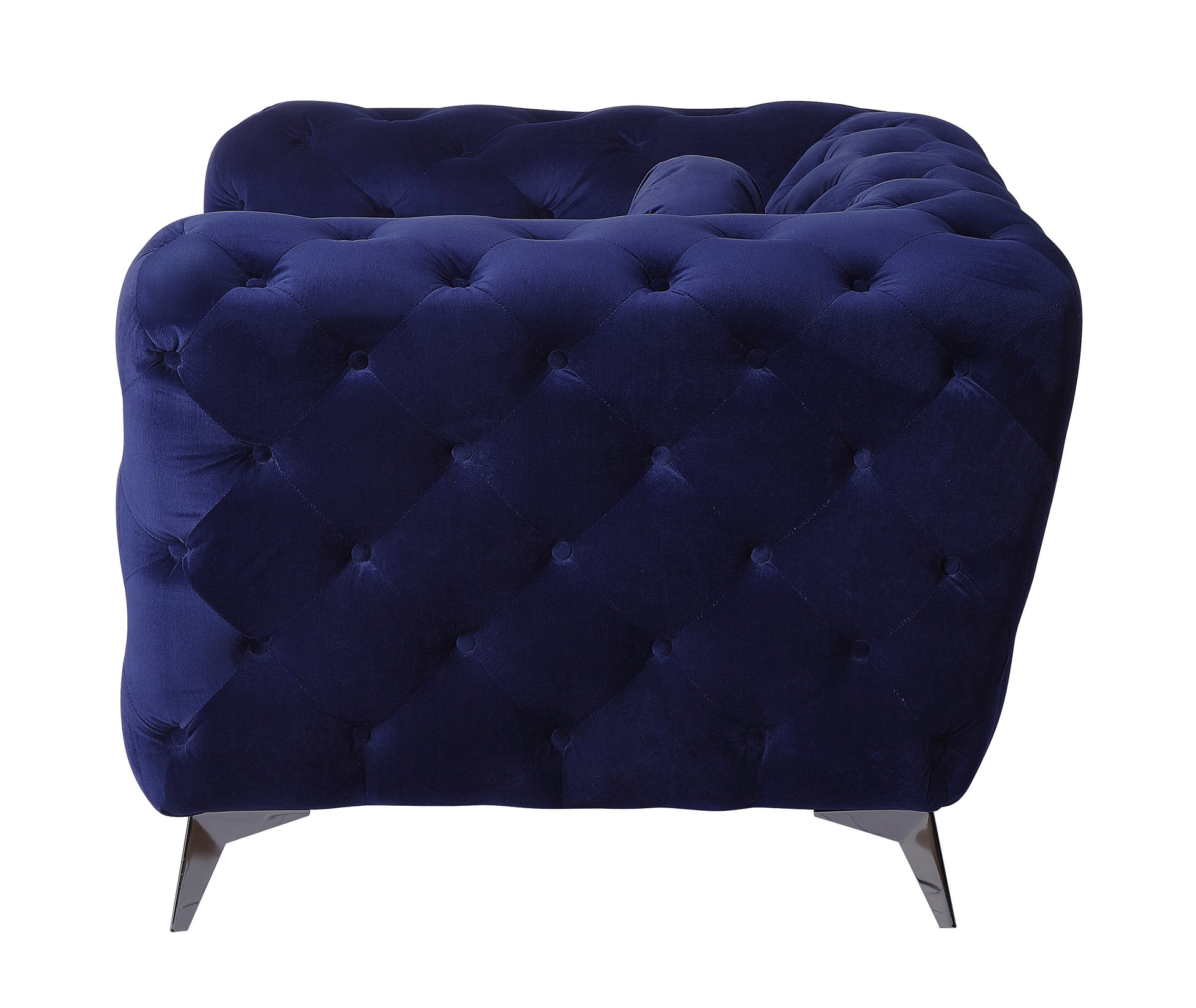 Deep blue velvet tufted armchair with diamond stitching and metal legs
