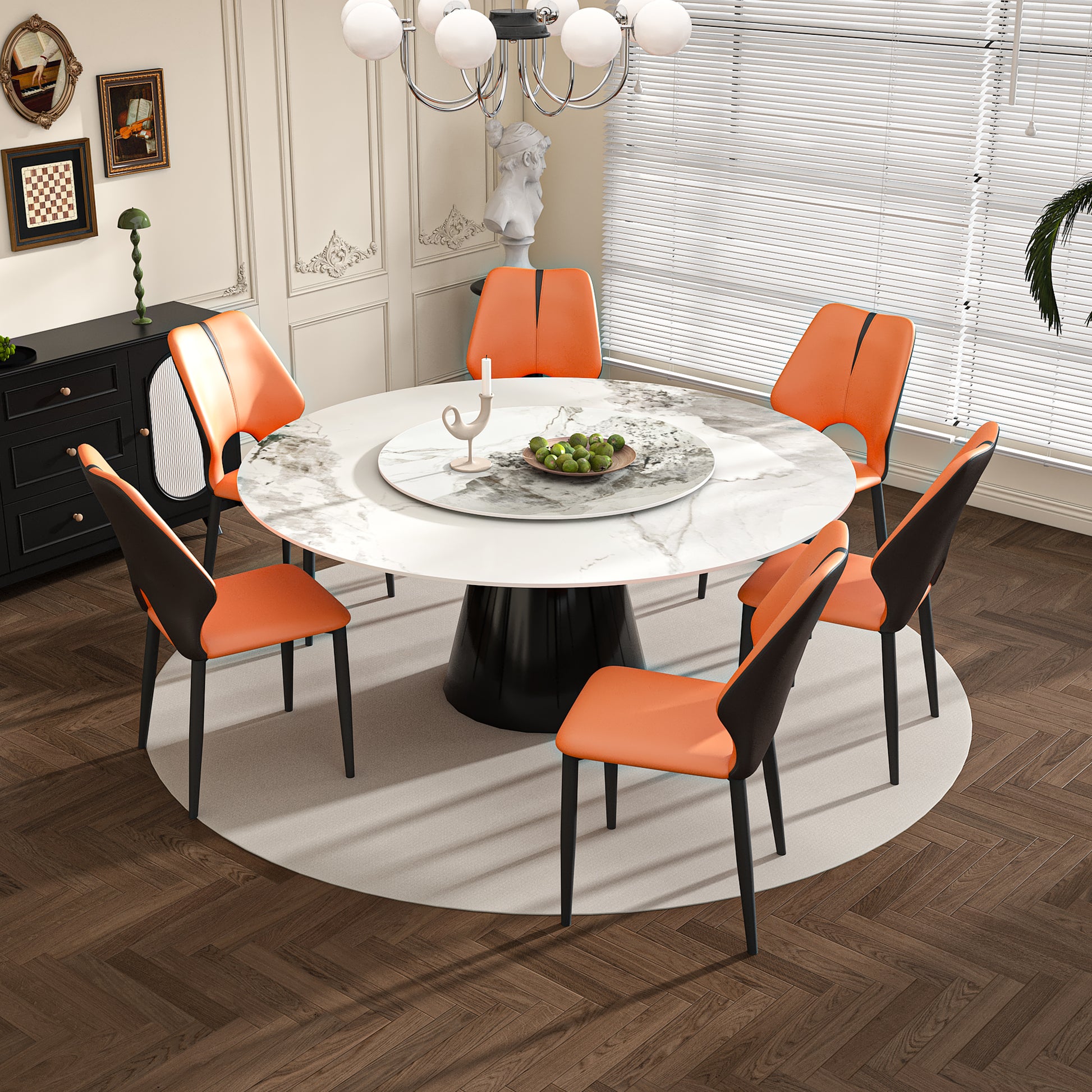 Modern dining set with round marblelook table and six orange faux leather chairs