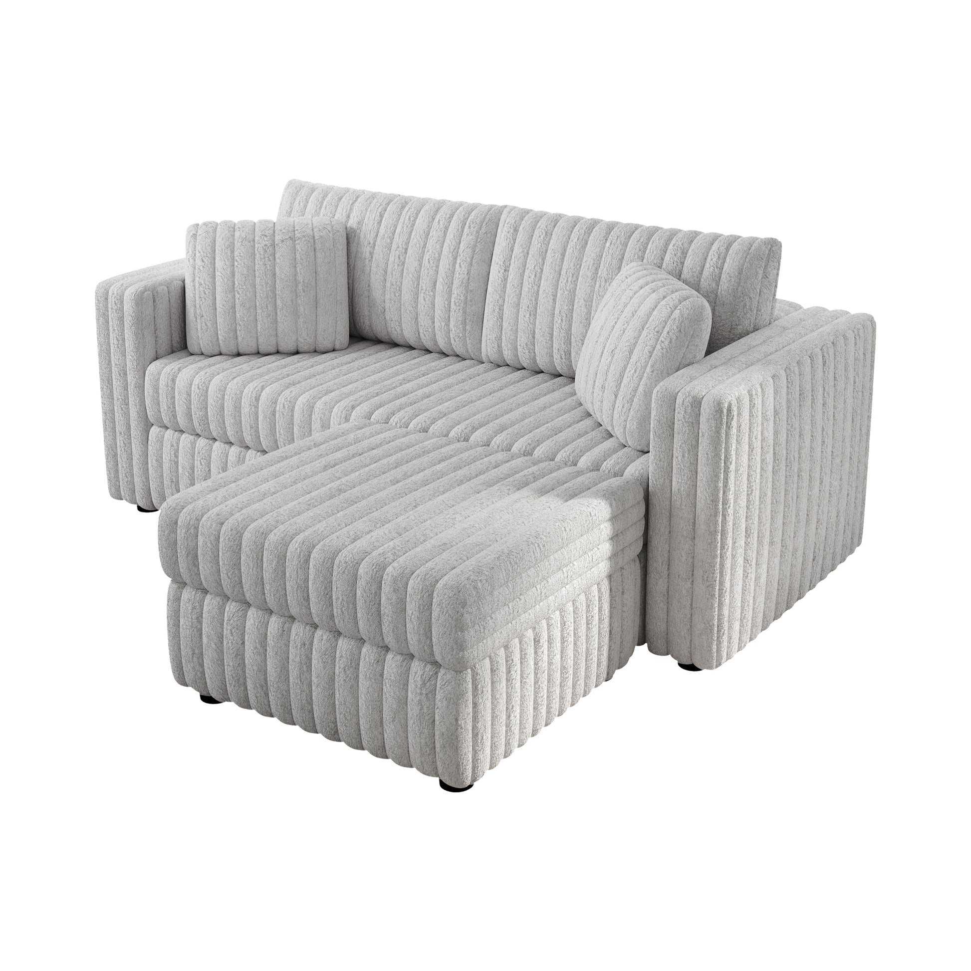 Plush grey sectional sofa with ribbed upholstery and two accent pillows
