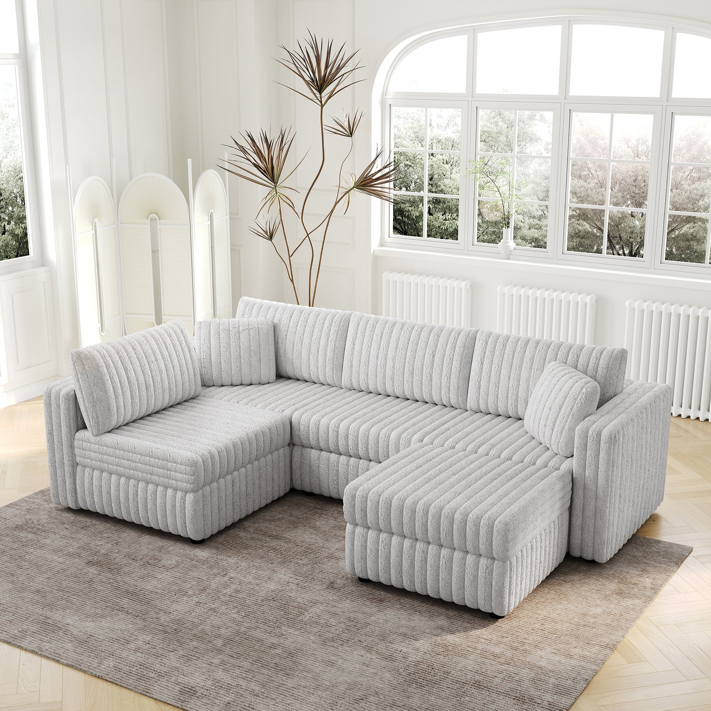 Plush grey sectional sofa with channel tufting and modular design