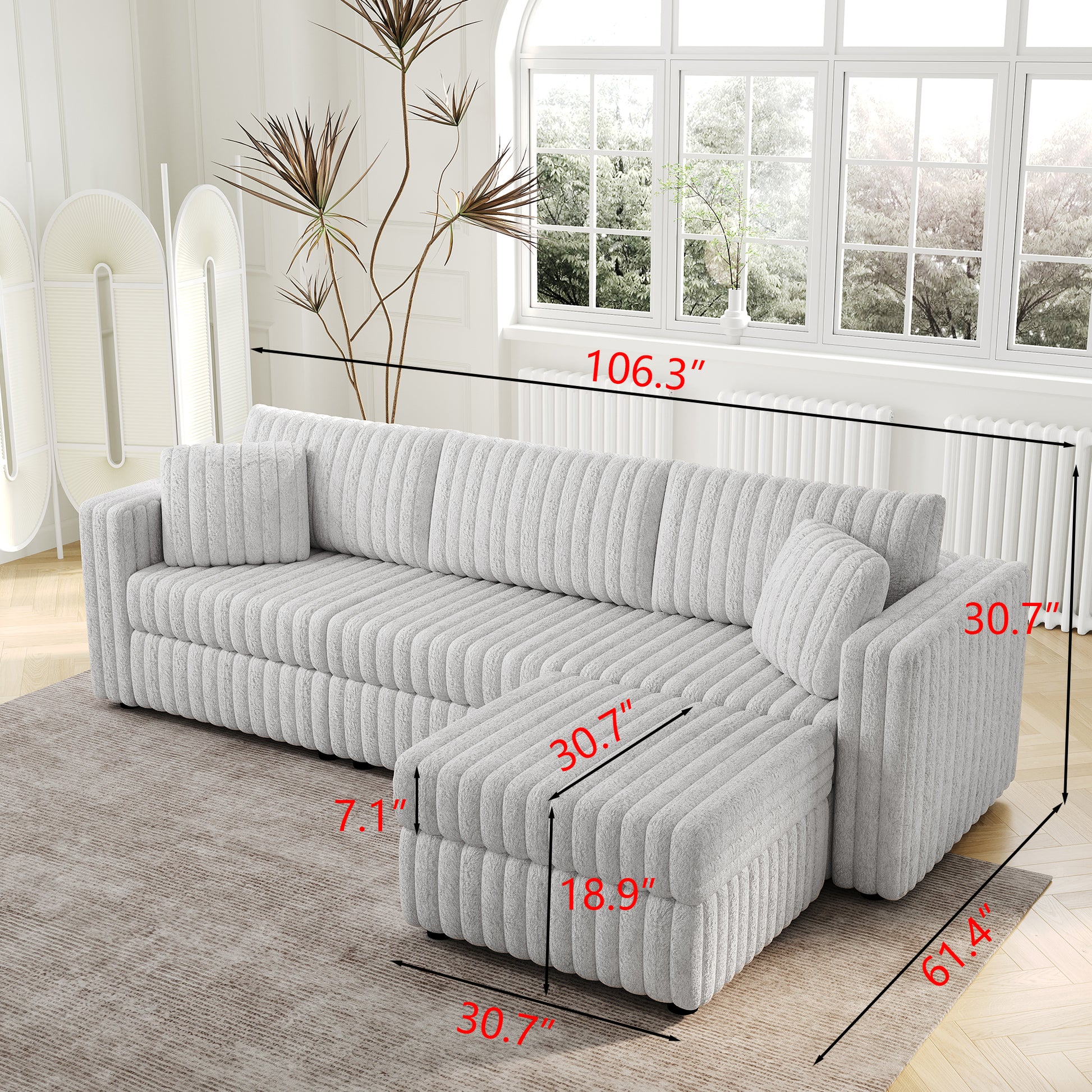 Light gray plush sectional sofa with ribbed texture and chaise lounge