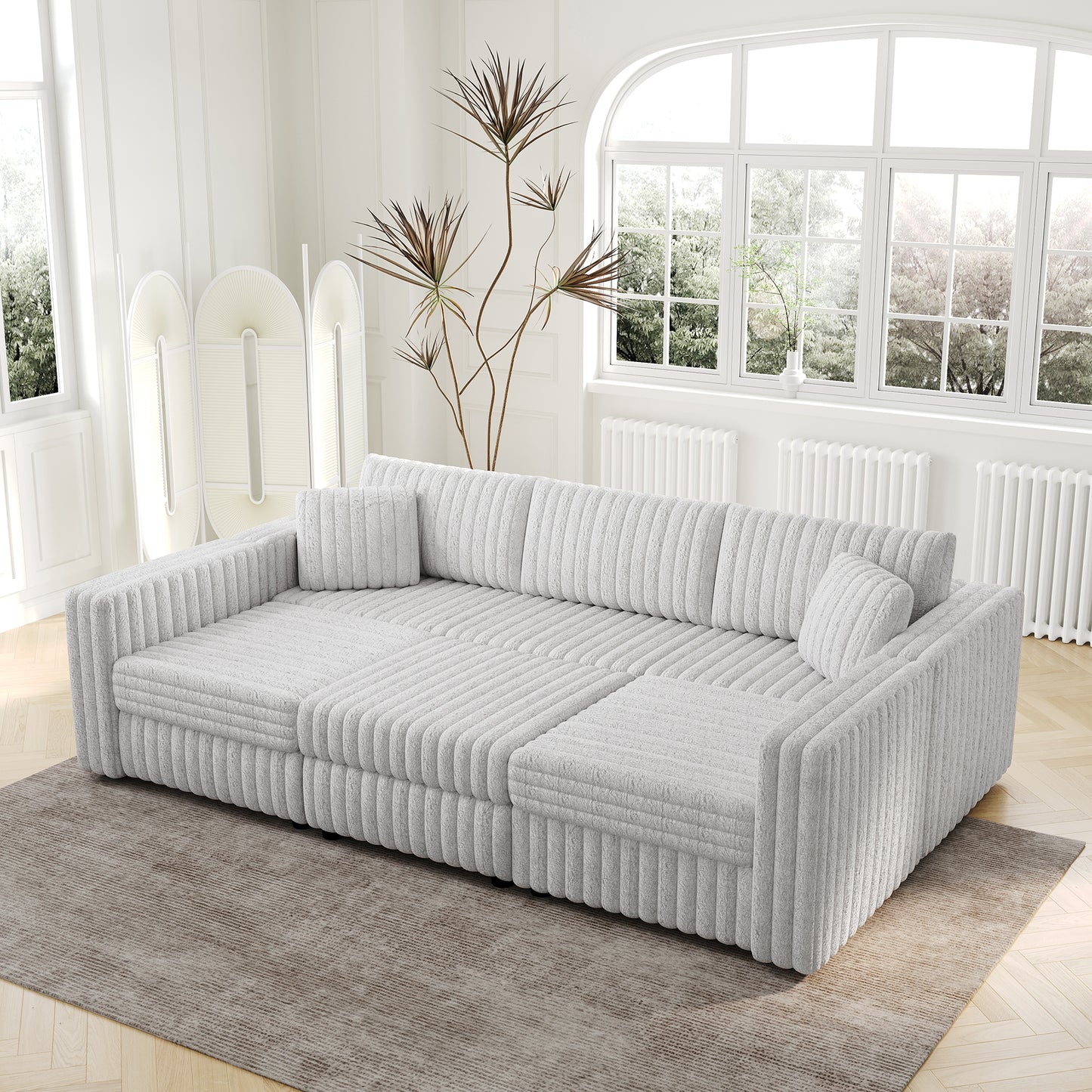 Plush grey corduroy sectional sofa with plush cushions and modern channel tufting