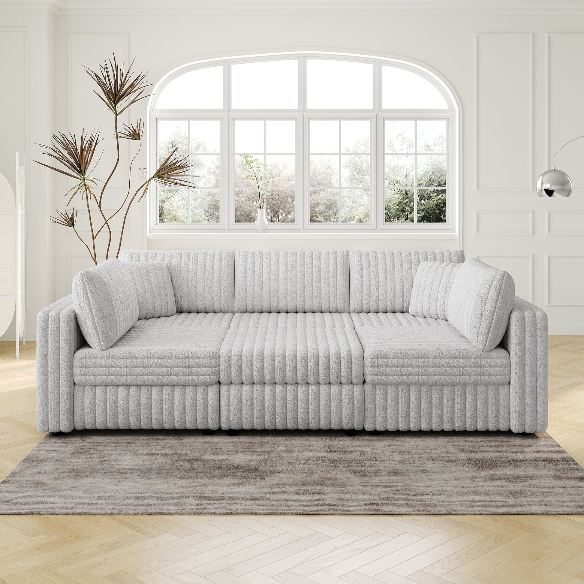Fluffy light grey sectional sofa with plush cushions and ribbed texture perfect for modern living rooms