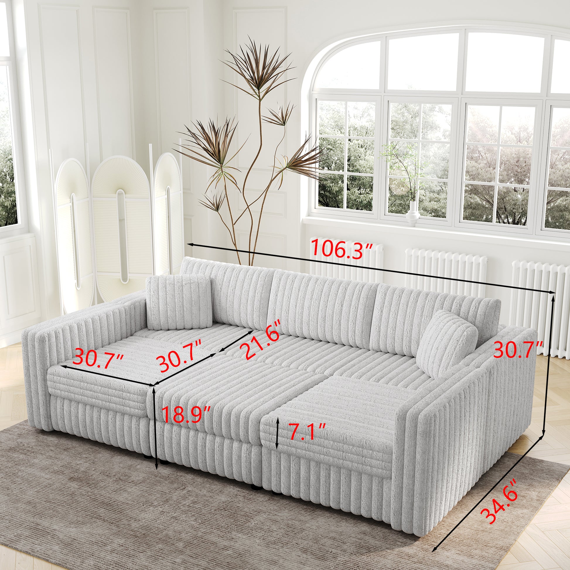 Plush gray sectional sofa with corduroylike texture plush accent pillows and ample seating space for a modern living room