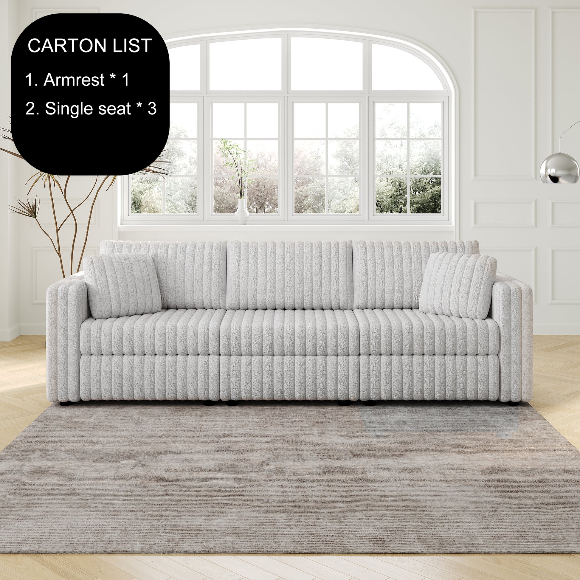 Plush grey ribbed sofa with matching throw pillows in a modern living room