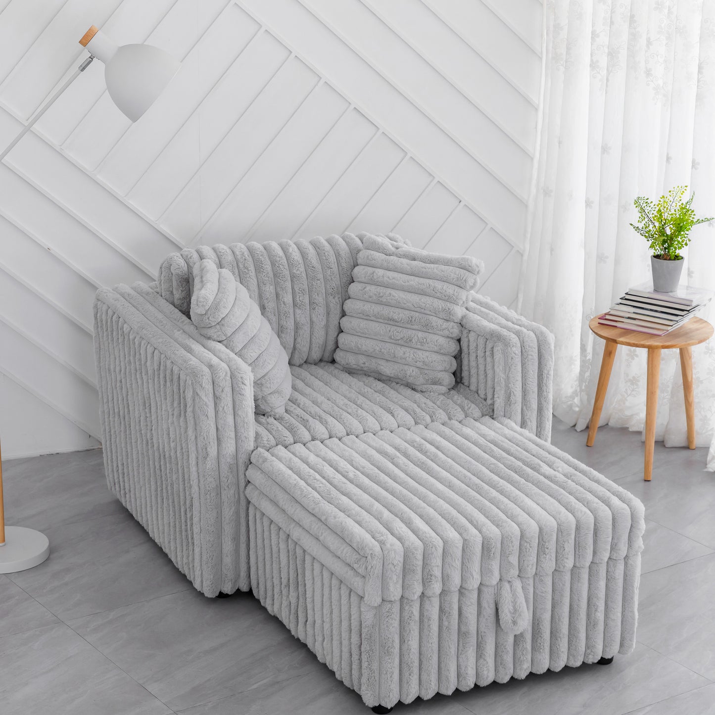 Plush grey corduroy sofa with matching ottoman and throw pillows cozy modern living room furniture