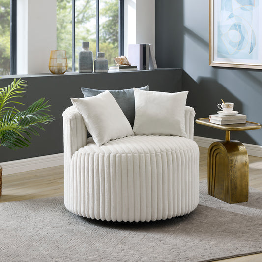 Plush white swivel accent chair with vertical ribbing and plush throw pillows
