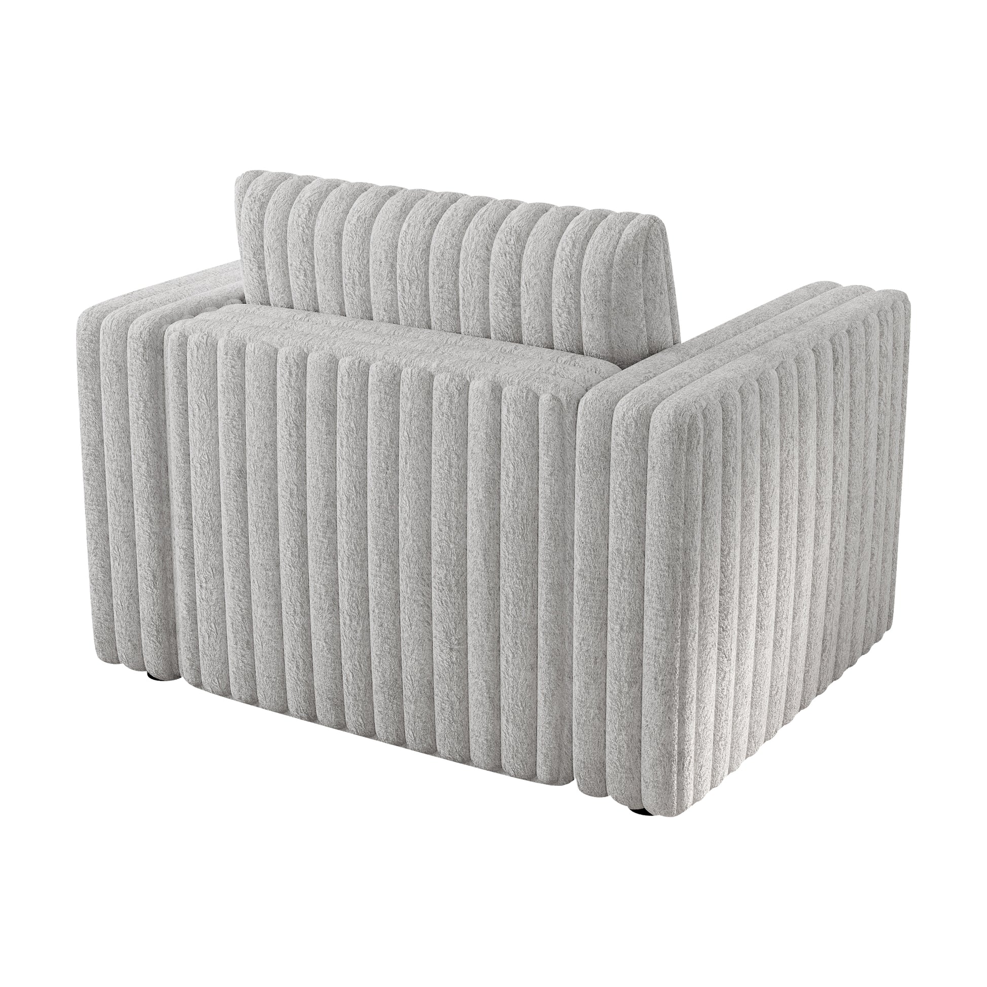 Textured light grey armchair with plush fabric and vertical channel tufting