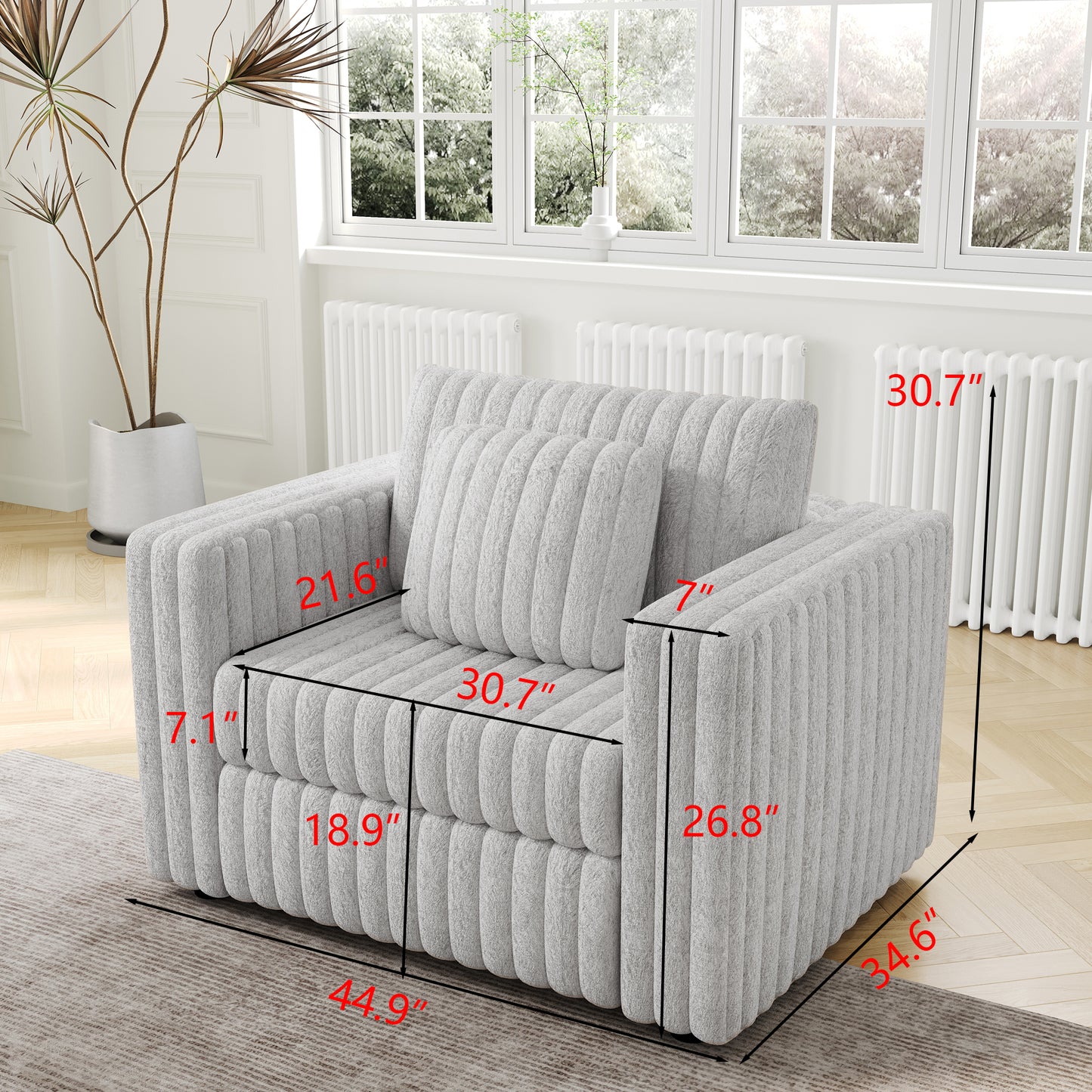 Cozy grey textured armchair with plush fabric featuring ribbed detailing and a matching lumbar pillow