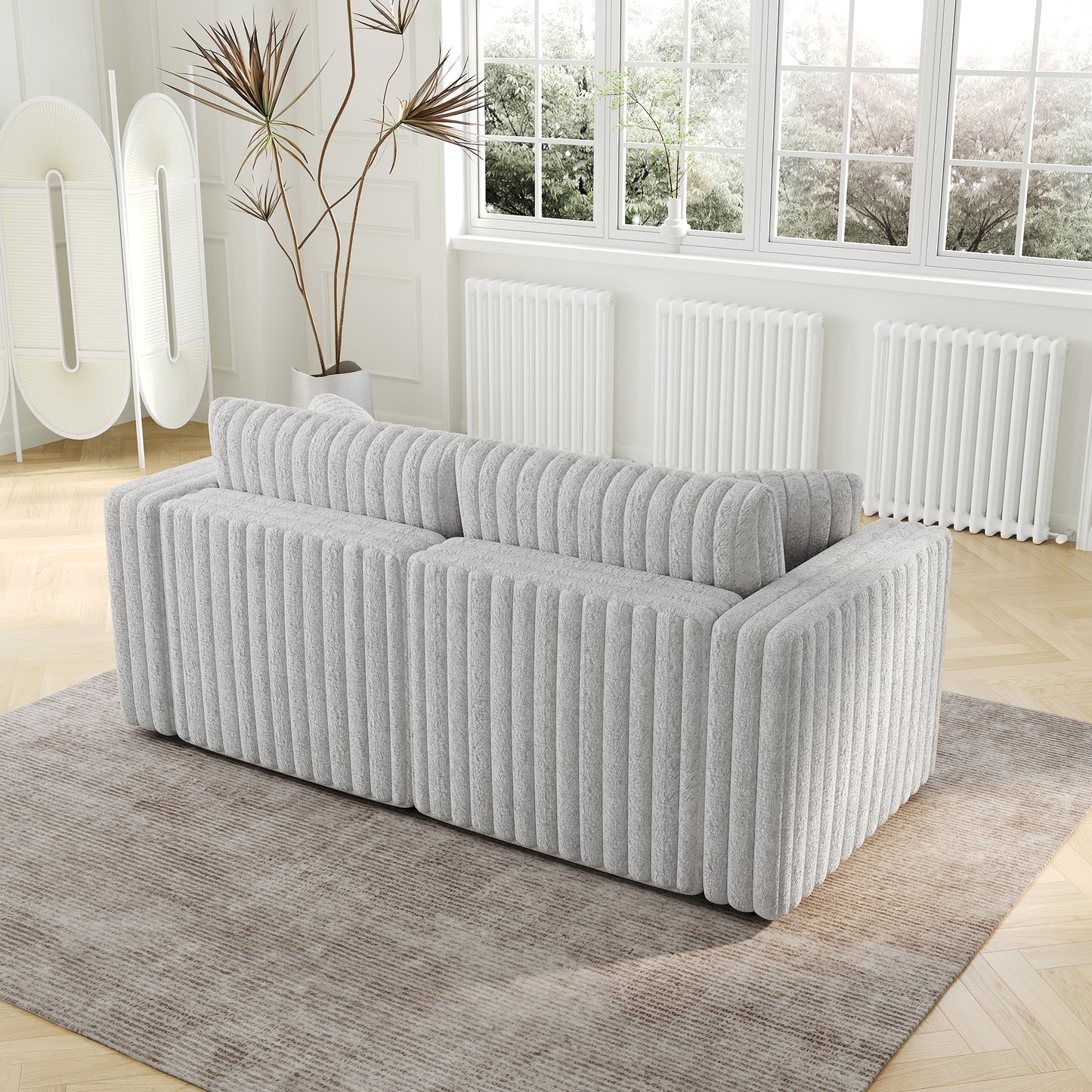 Soft grey fabric couch with vertical channel tufting modern design