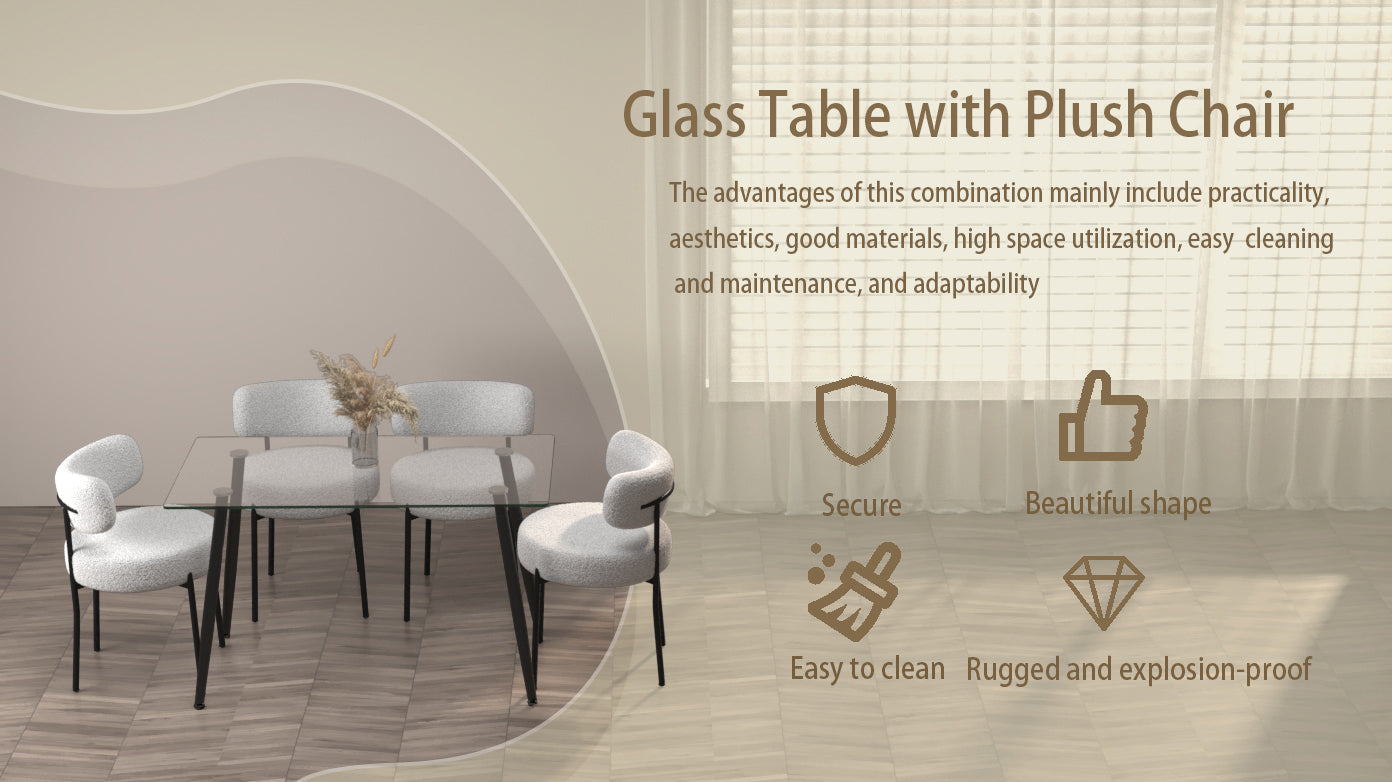 Modern glass dining table with four plush boucle chairs in a clean dining room