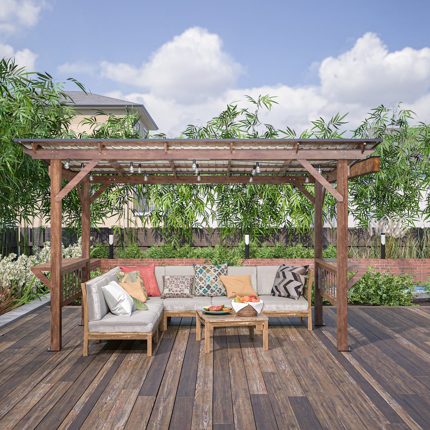 Wooden pergola with string lights and outdoor sectional sofa with colorful throw pillows