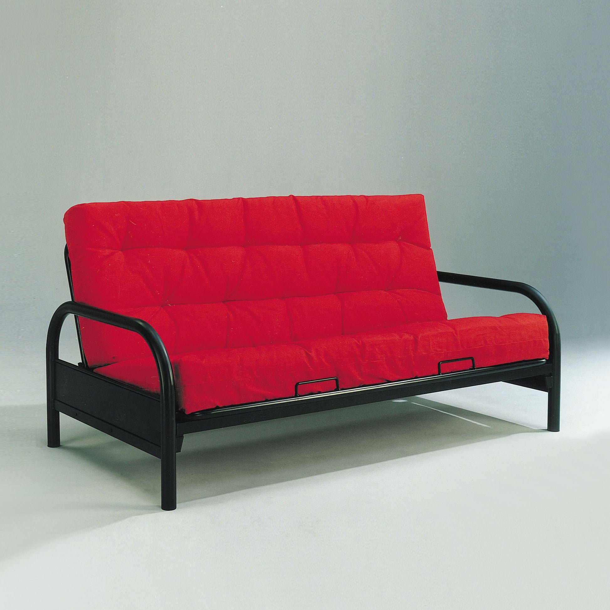 Red futon sofa with black metal frame tufted cushions ideal for small spaces