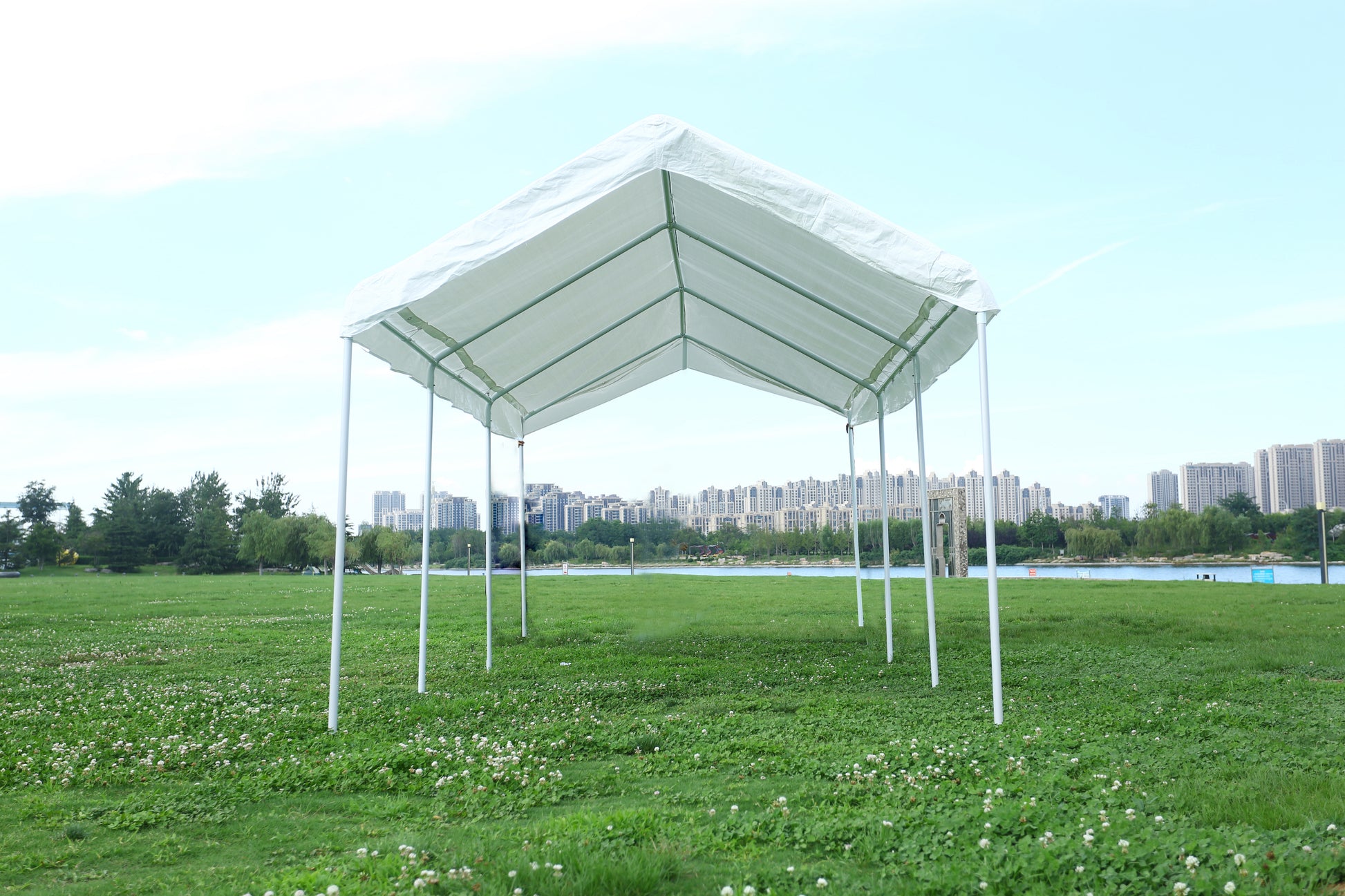 White canopy tent with metal frame open air providing shade