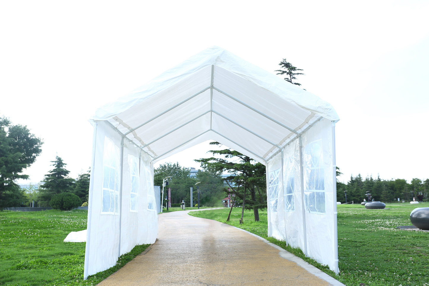 White party tent with transparent windows perfect for outdoor events and gatherings