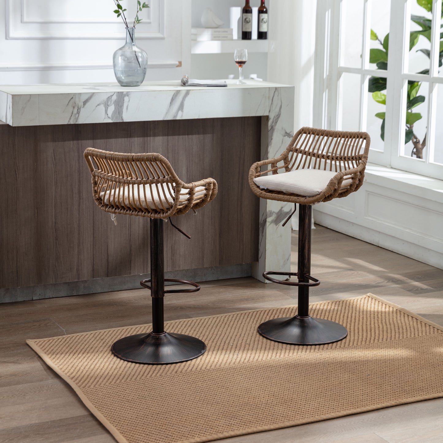 Two natural rattan bar stools with adjustable height and cushioned seats on a textured rug