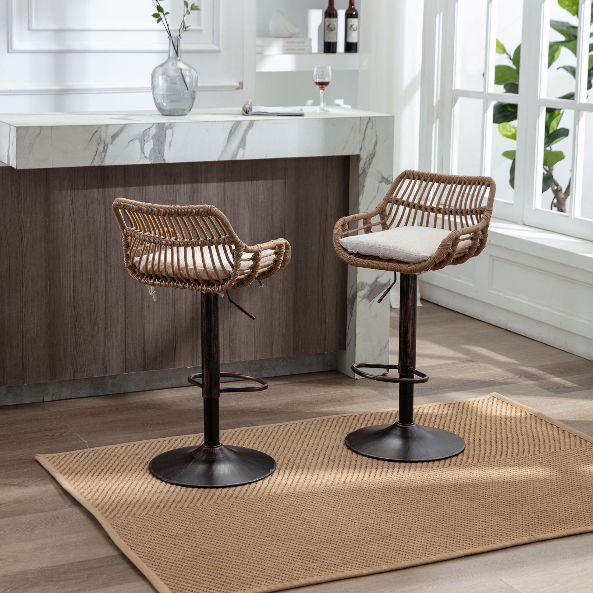 Two natural rattan bar stools with adjustable height and cushioned seats on a textured rug
