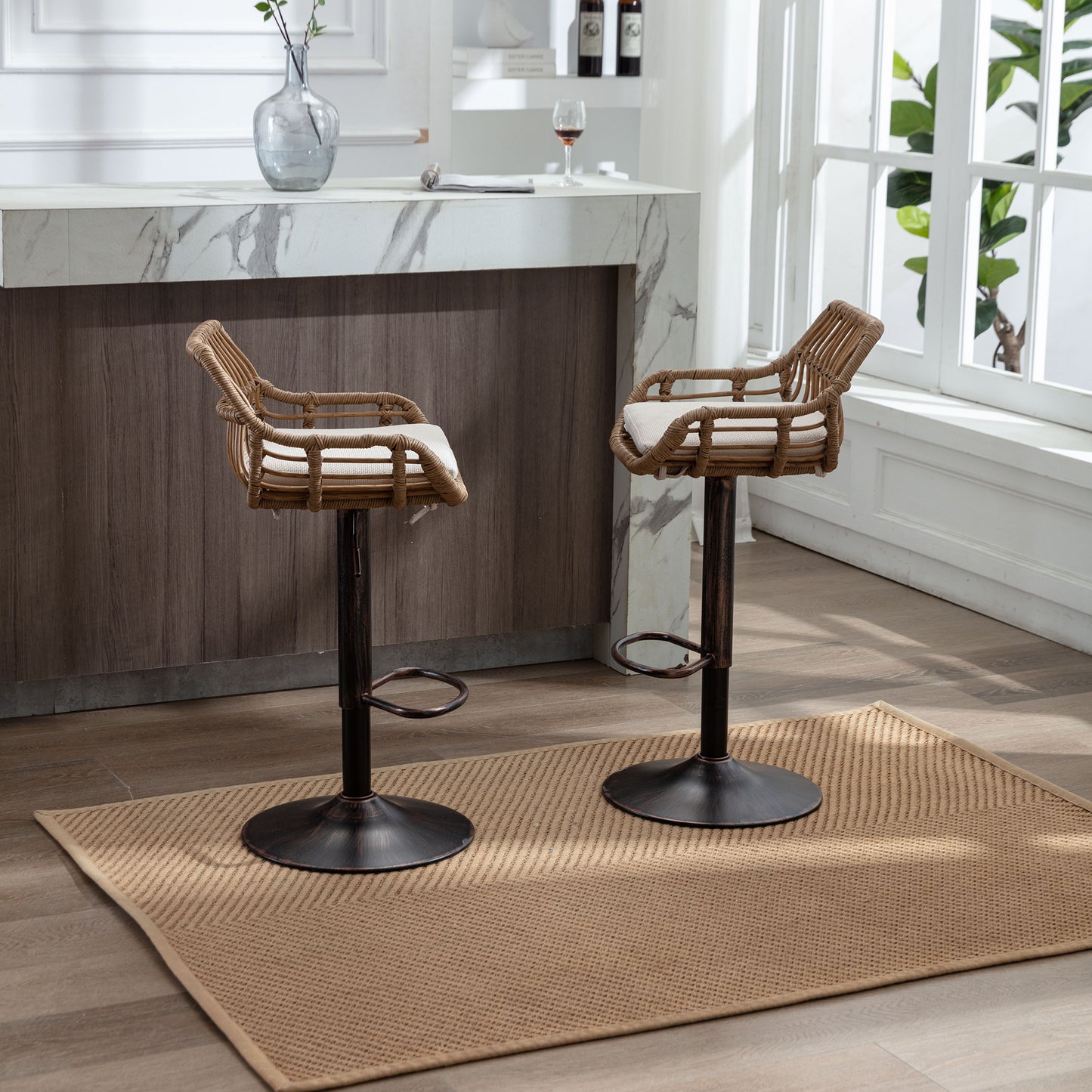 Woven rattan bar stools with white cushions and adjustable bronze bases