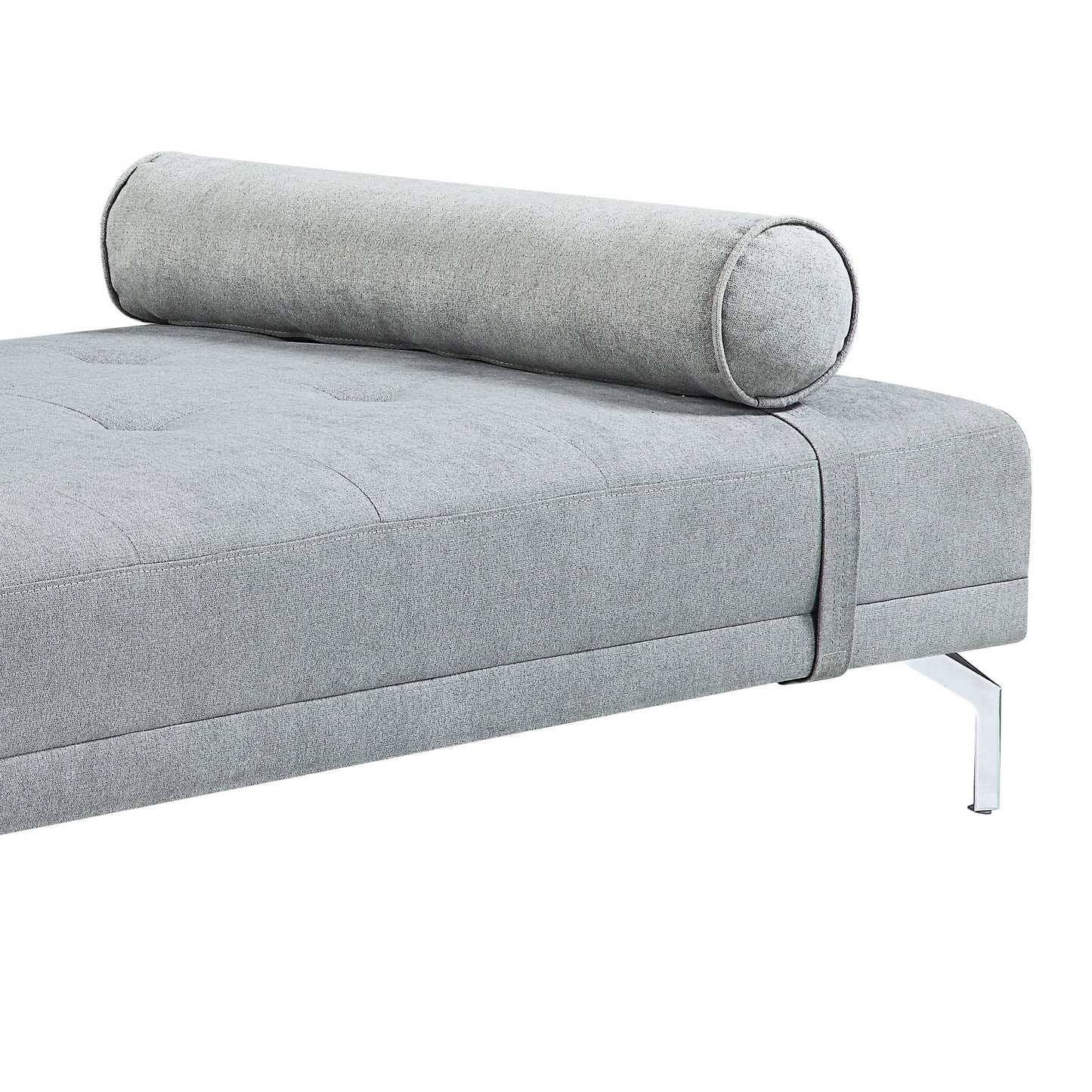 Grey fabric sofa with bolster pillow tufted seat and chrome legs