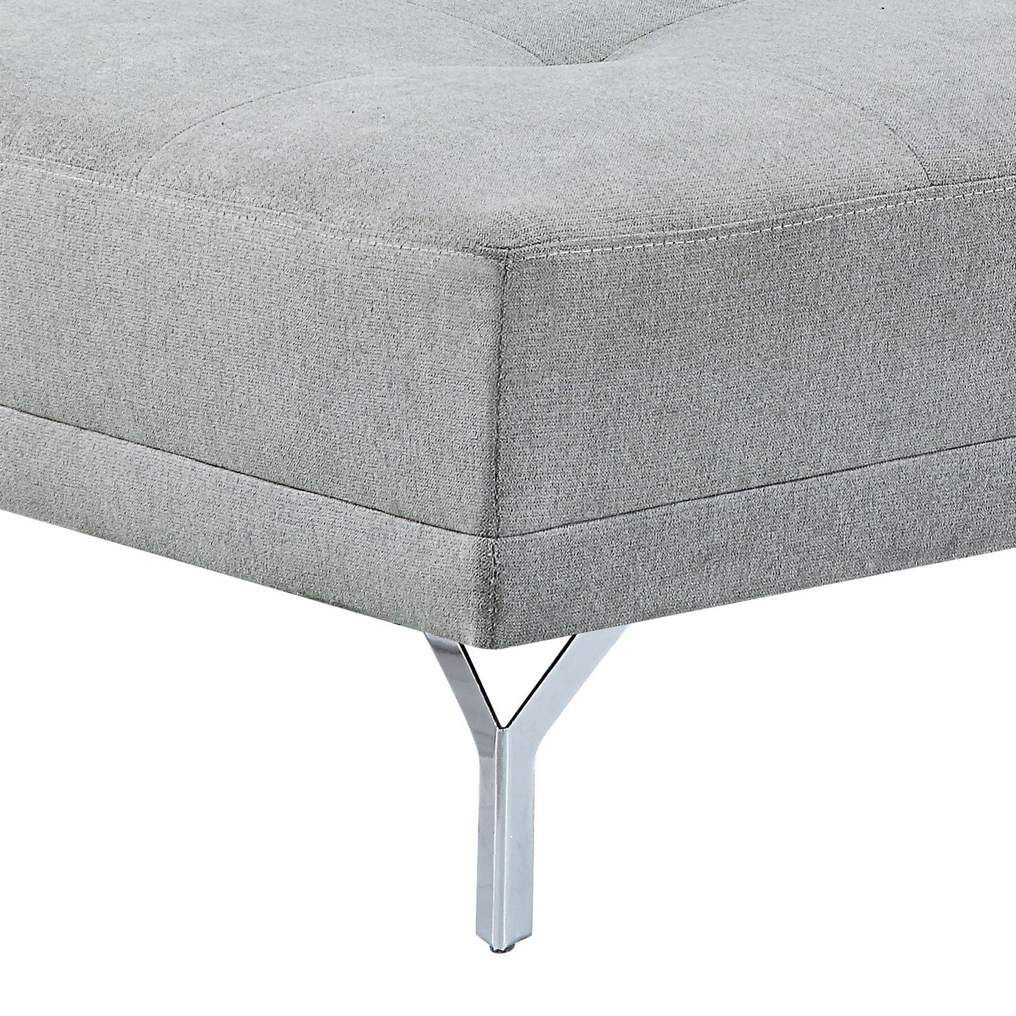 Light gray tufted upholstered ottoman with chrome legs modern design