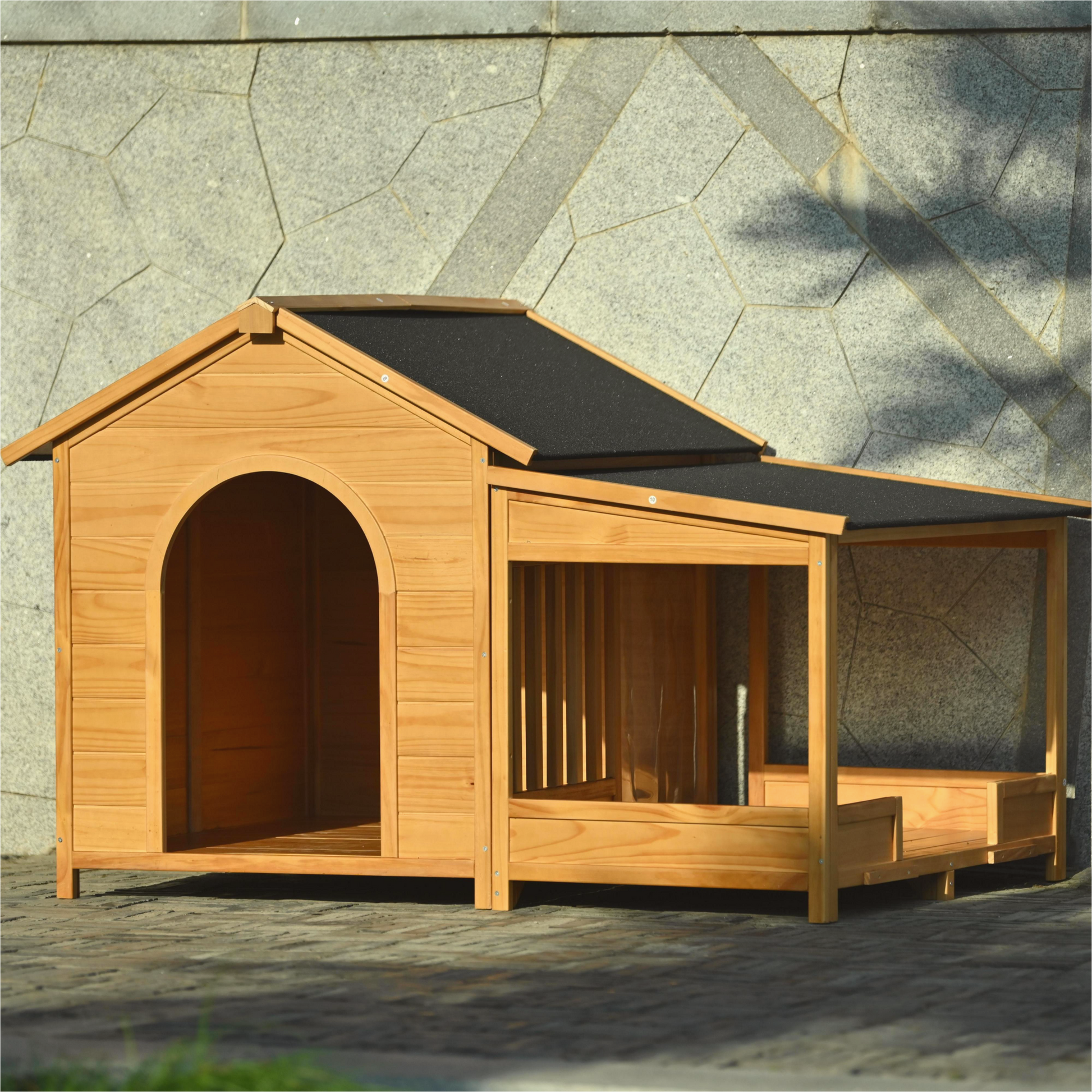 Wooden dog house with open porch and arched doorway natural pine finish