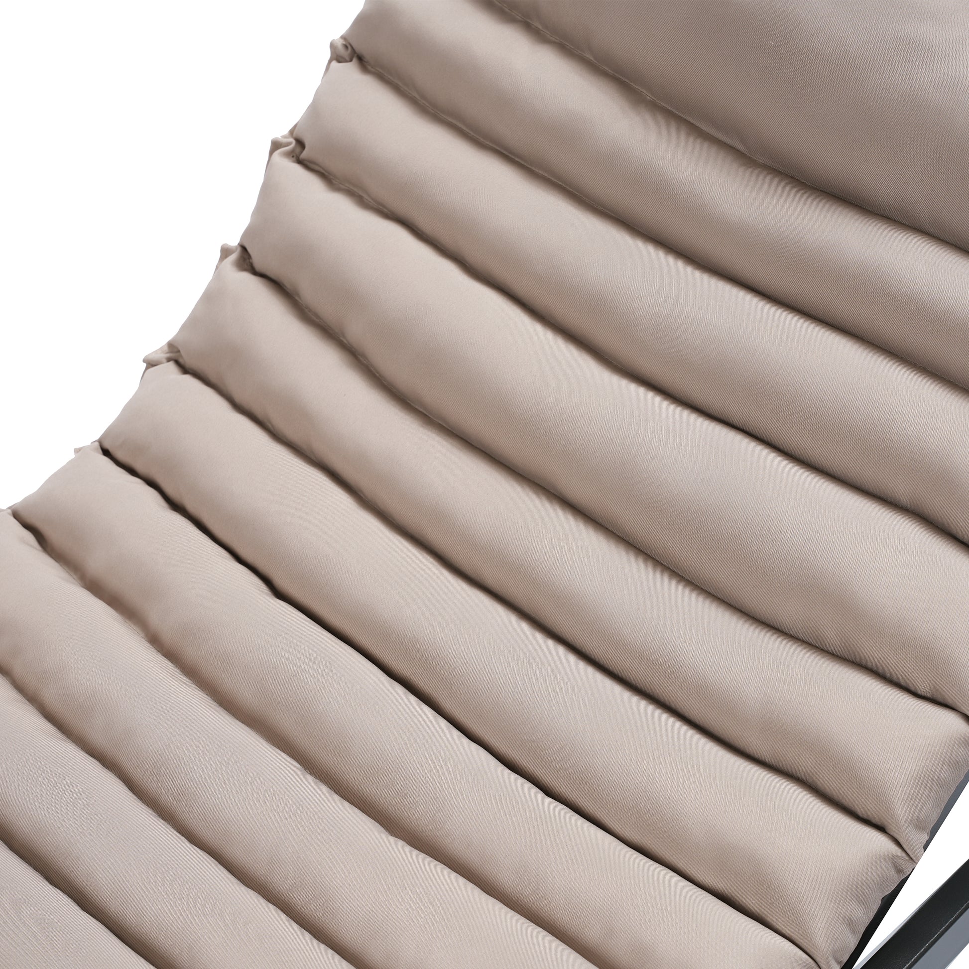 Textured beige fabric on a modern lounge chair with channel quilting