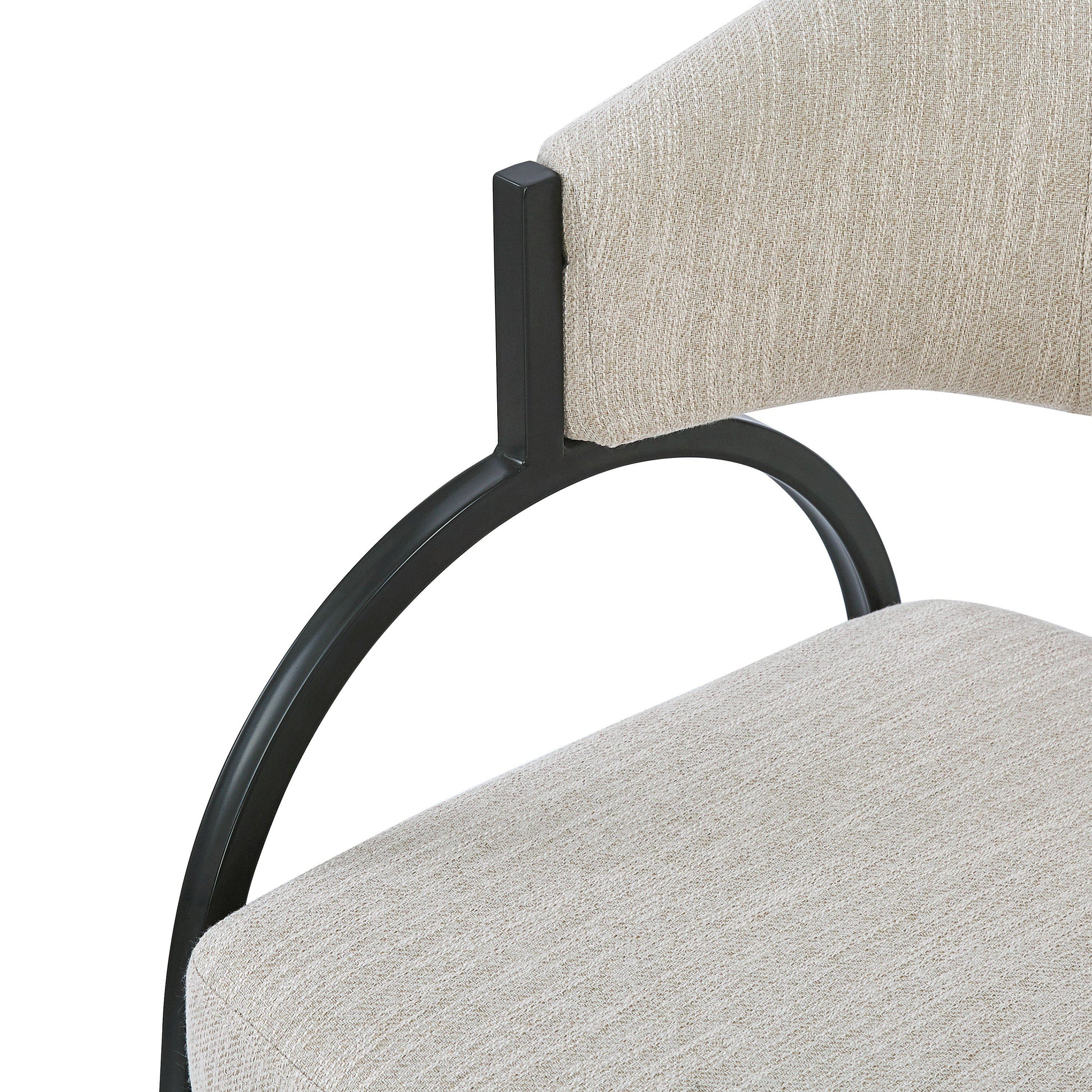 Beige textured fabric upholstered dining chair with curved black metal frame