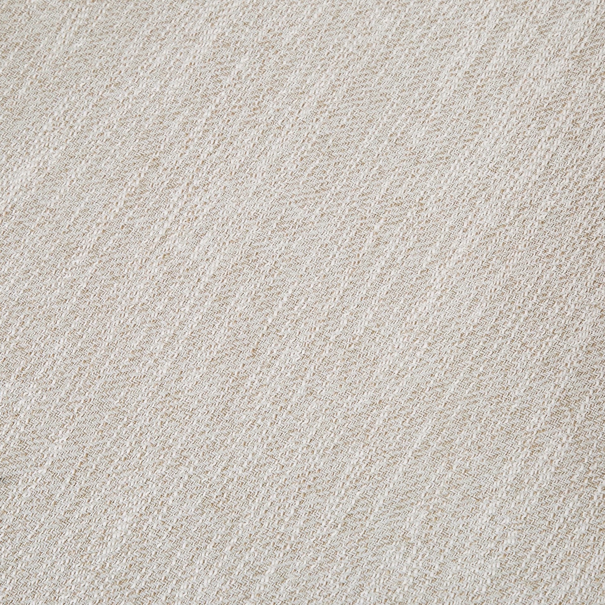 Textured beige linen fabric with a subtle herringbone weave pattern