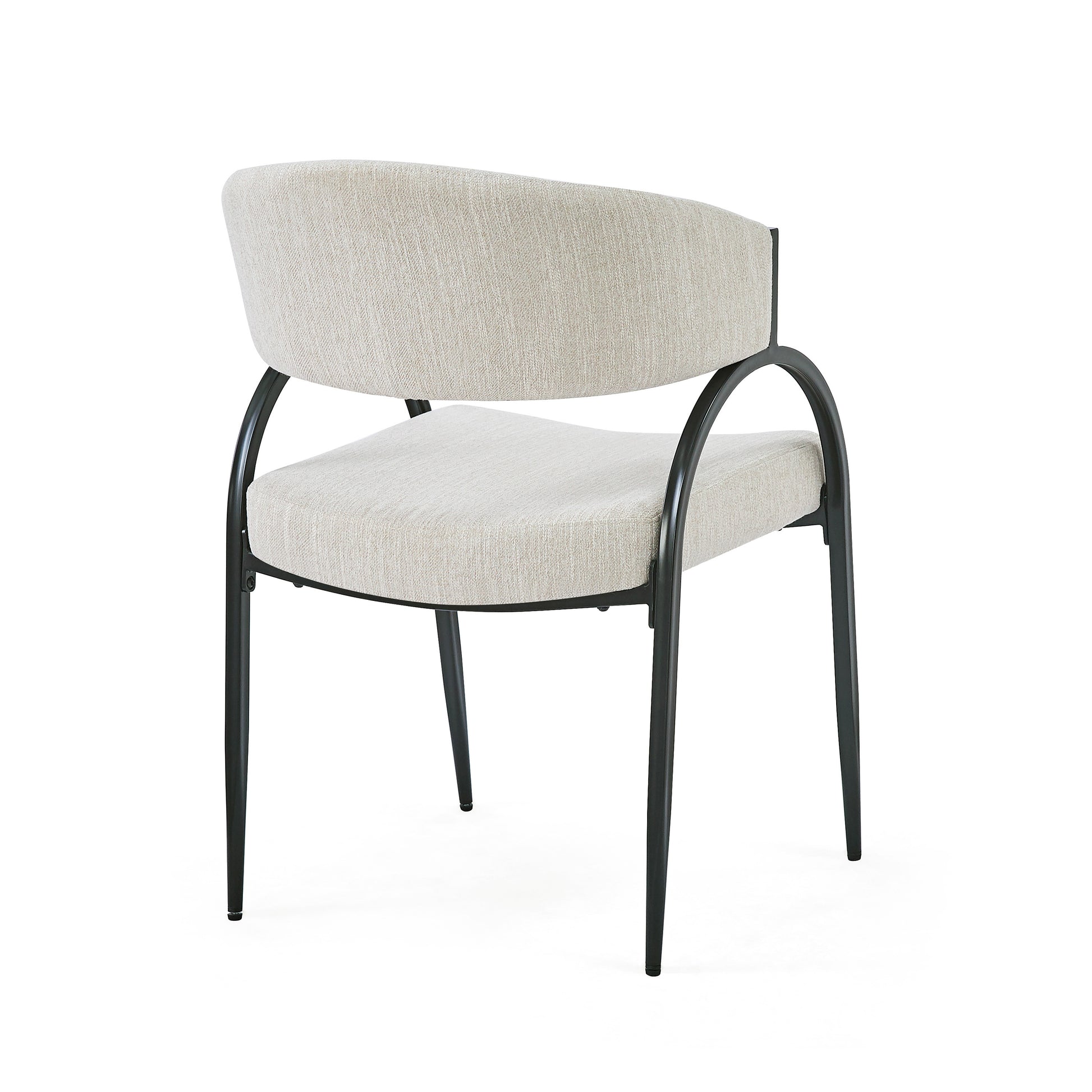 Beige upholstered accent chair with black metal legs comfortable for dining rooms