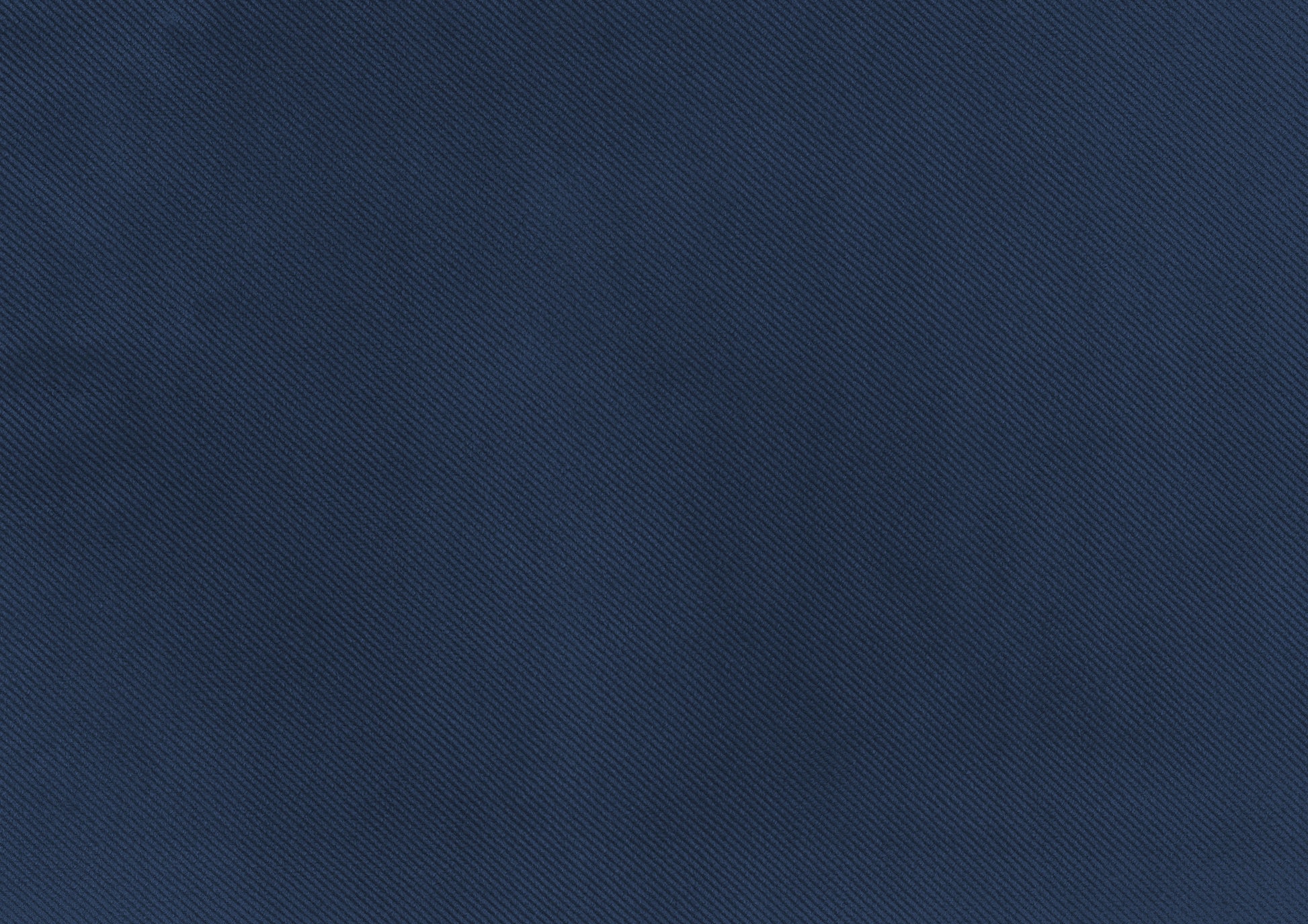 Dark navy blue woven twill fabric swatch with diagonal ridges for upholstery