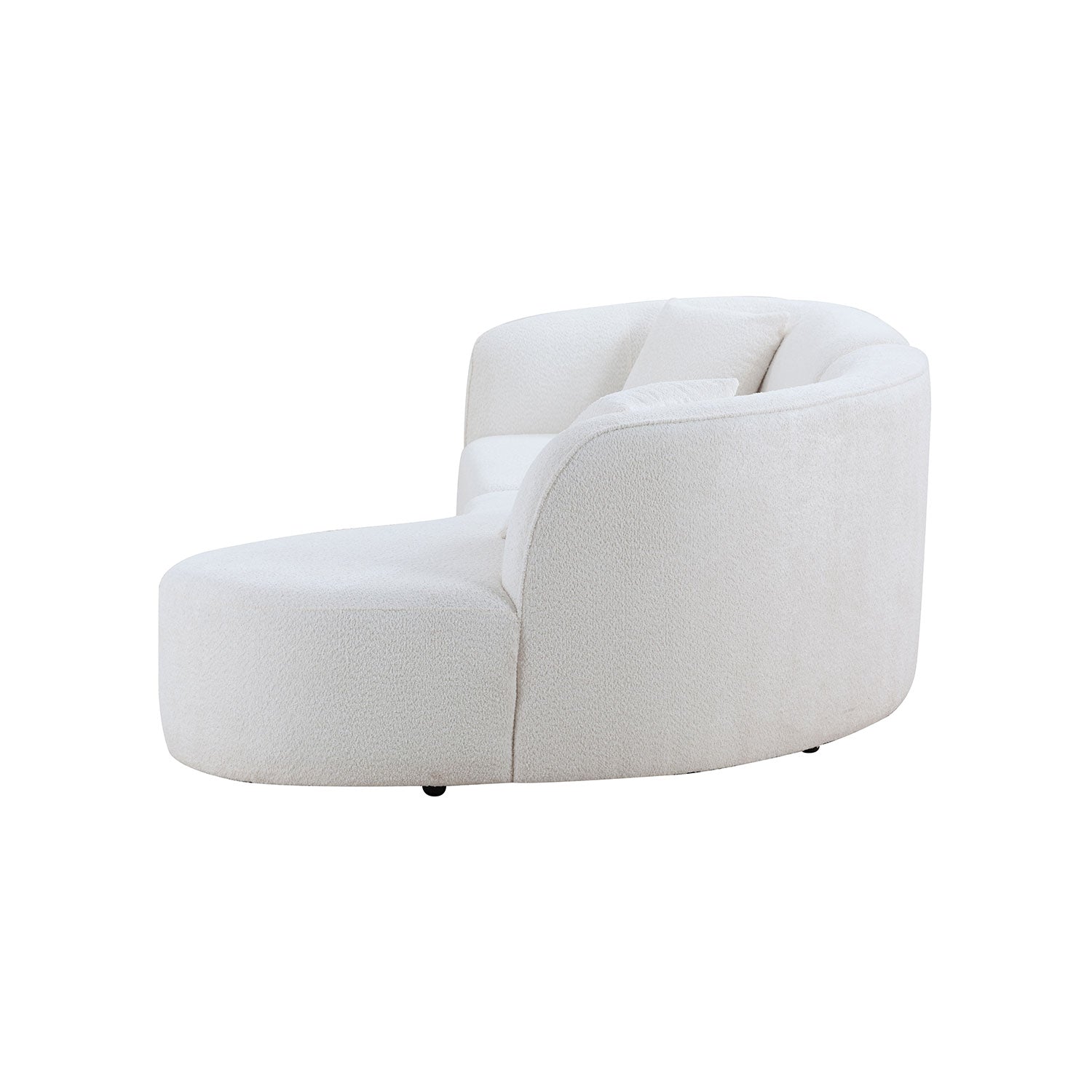 Cozy cream boucle chaise lounge with plush pillows and rounded arms perfect for relaxation