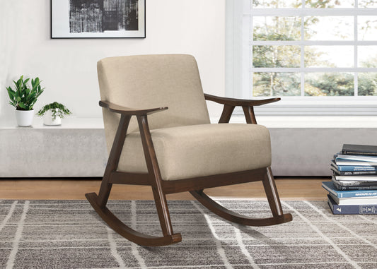 Comfortable beige upholstered wooden rocking chair with curved arms and dark wood frame