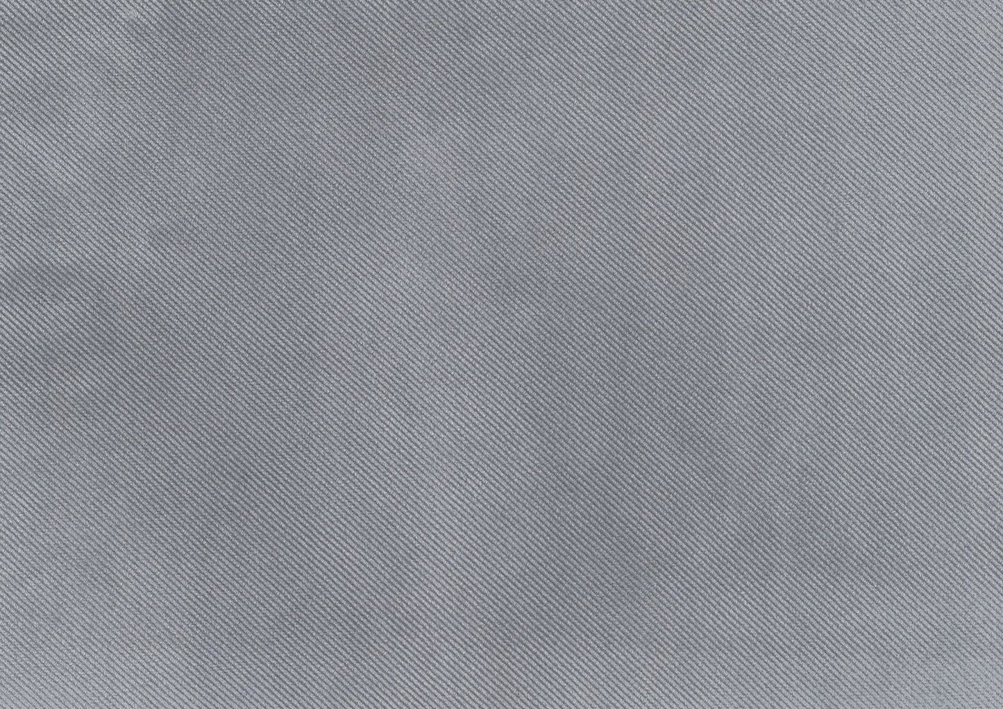 Closeup texture of light gray woven fabric with diagonal ribbed pattern