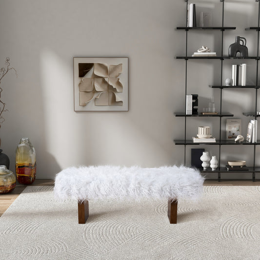 Plush white faux fur bench with dark wood legs for stylish seating